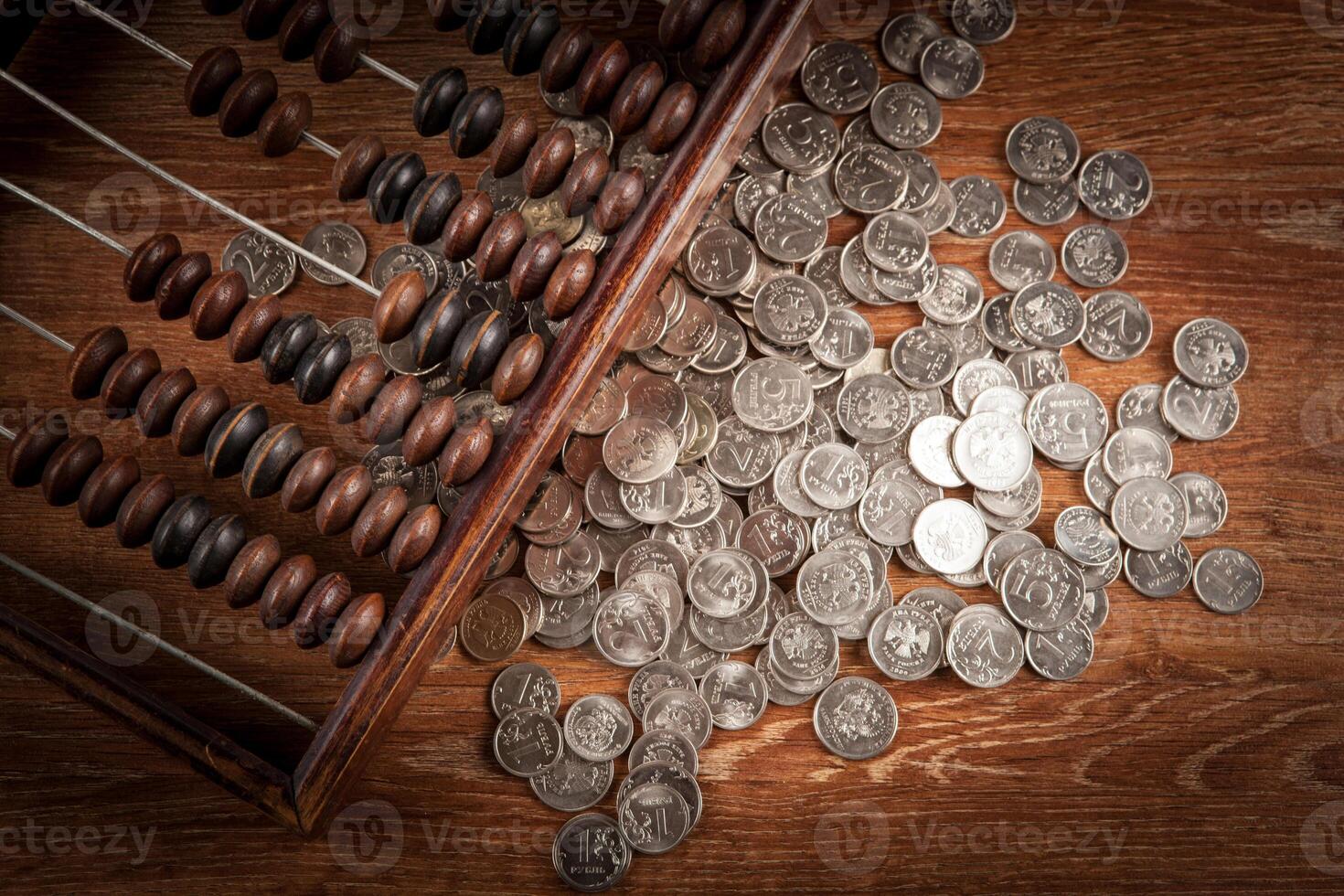 old abacus with russian ruble coins top view photo
