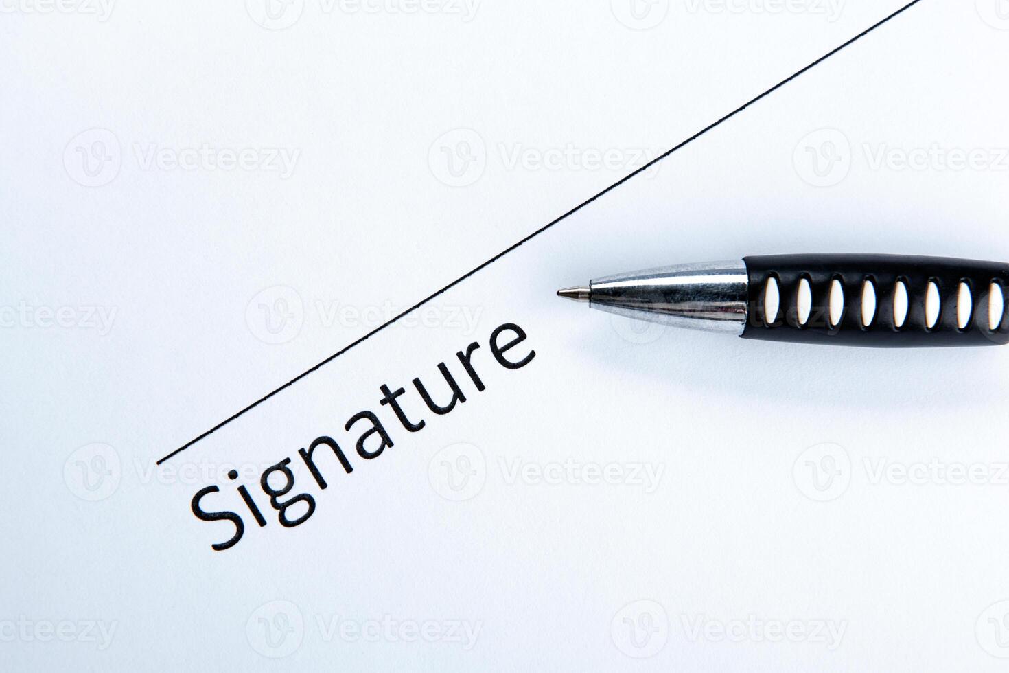 One document with a place for a signature and a pen photo