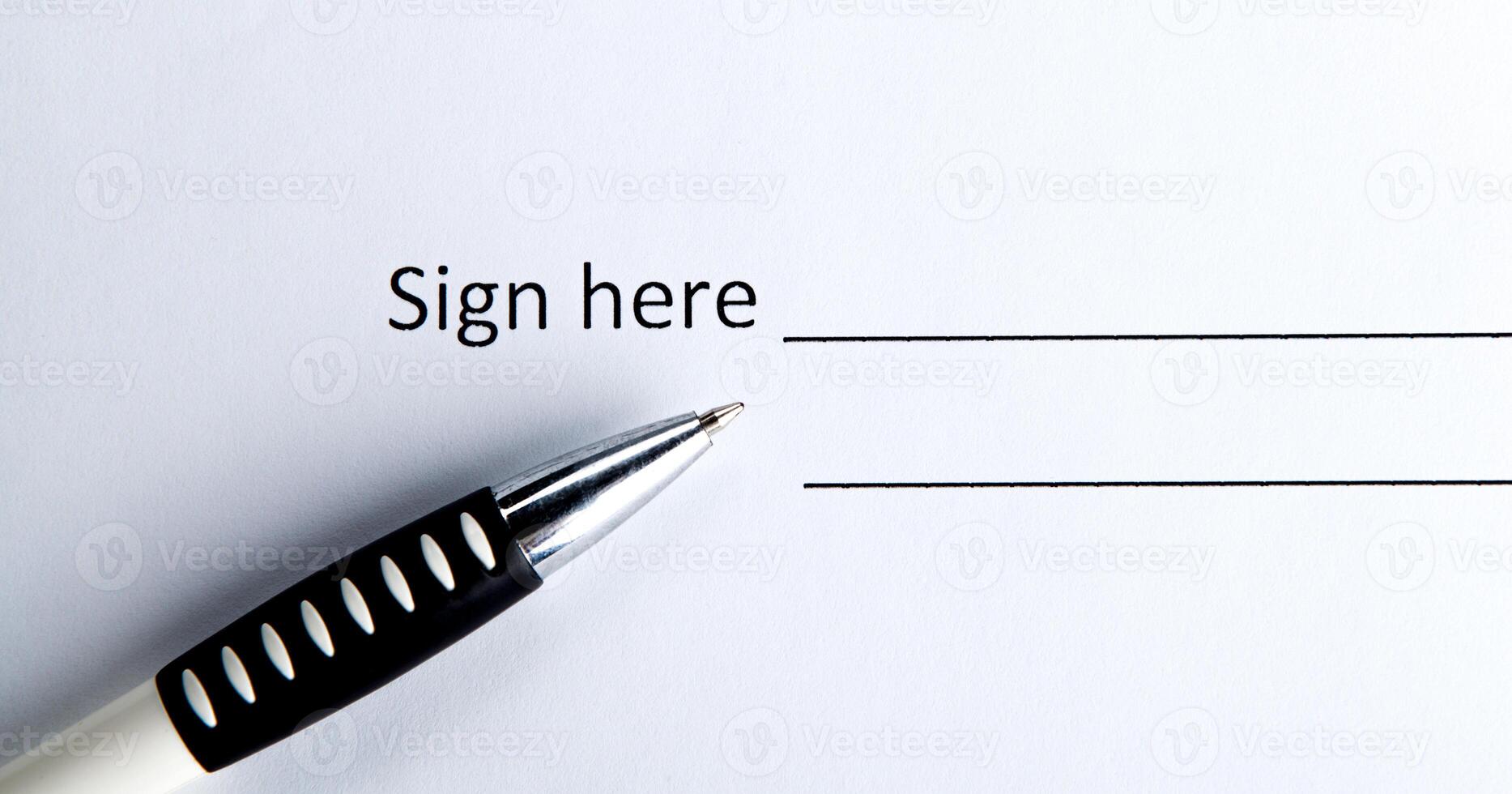 One document with a place for a signature and a pen photo