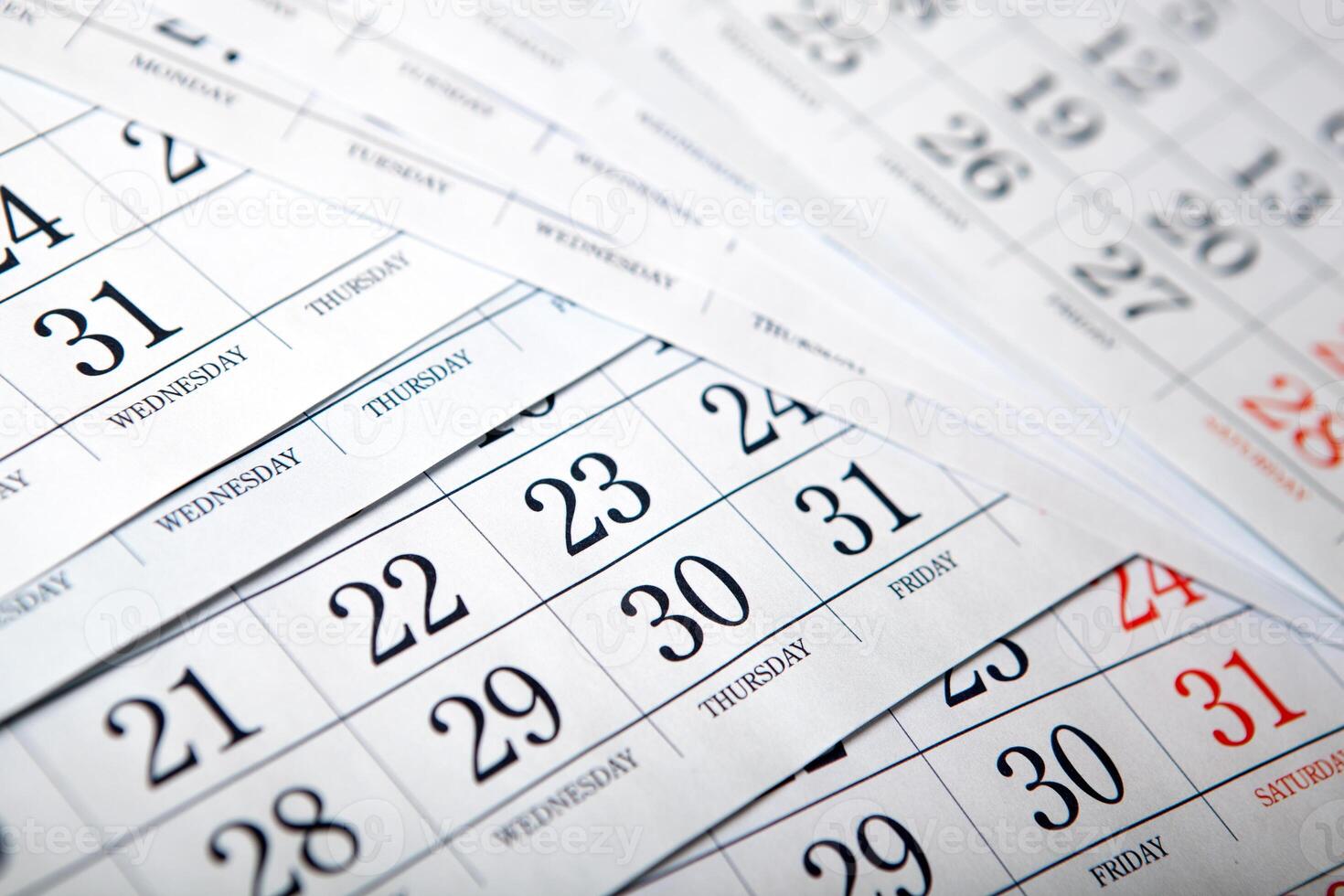 pile of calendar sheets close up photo