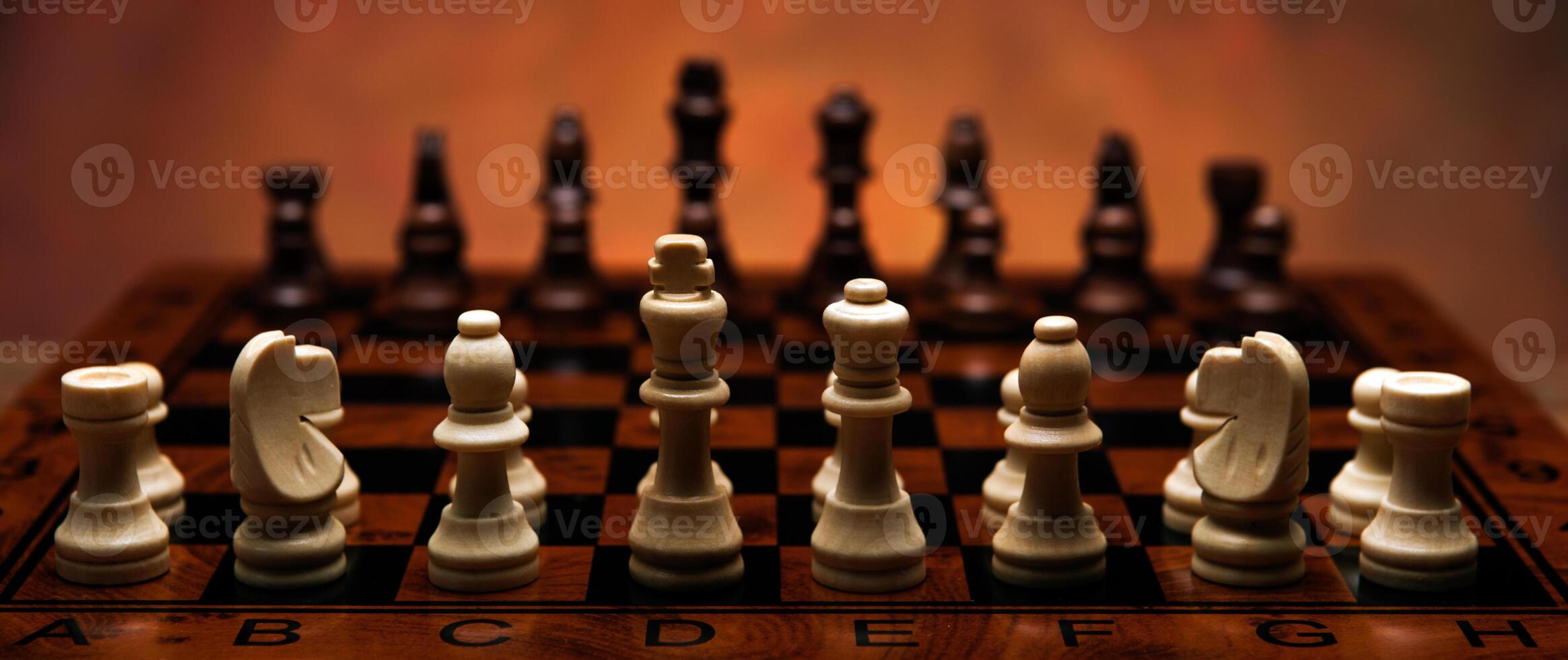 chess game with pieces on the table photo