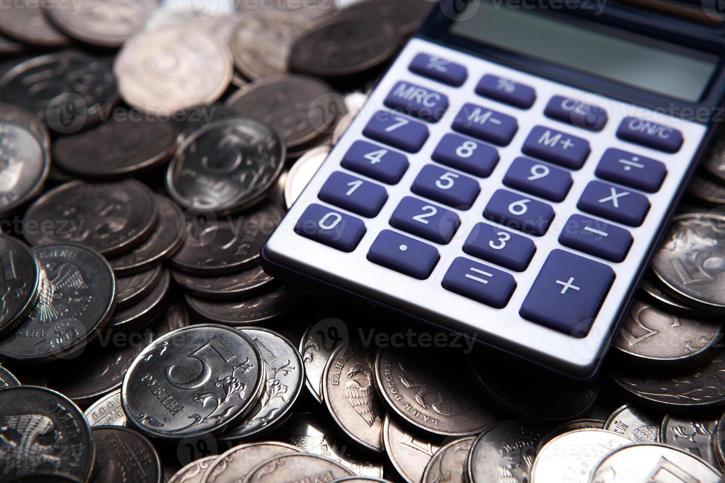money in the form of coins with calculator photo