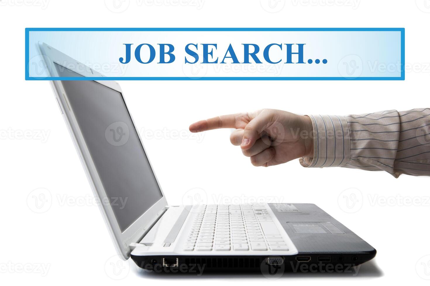 human hand on the keyboard in search of work photo