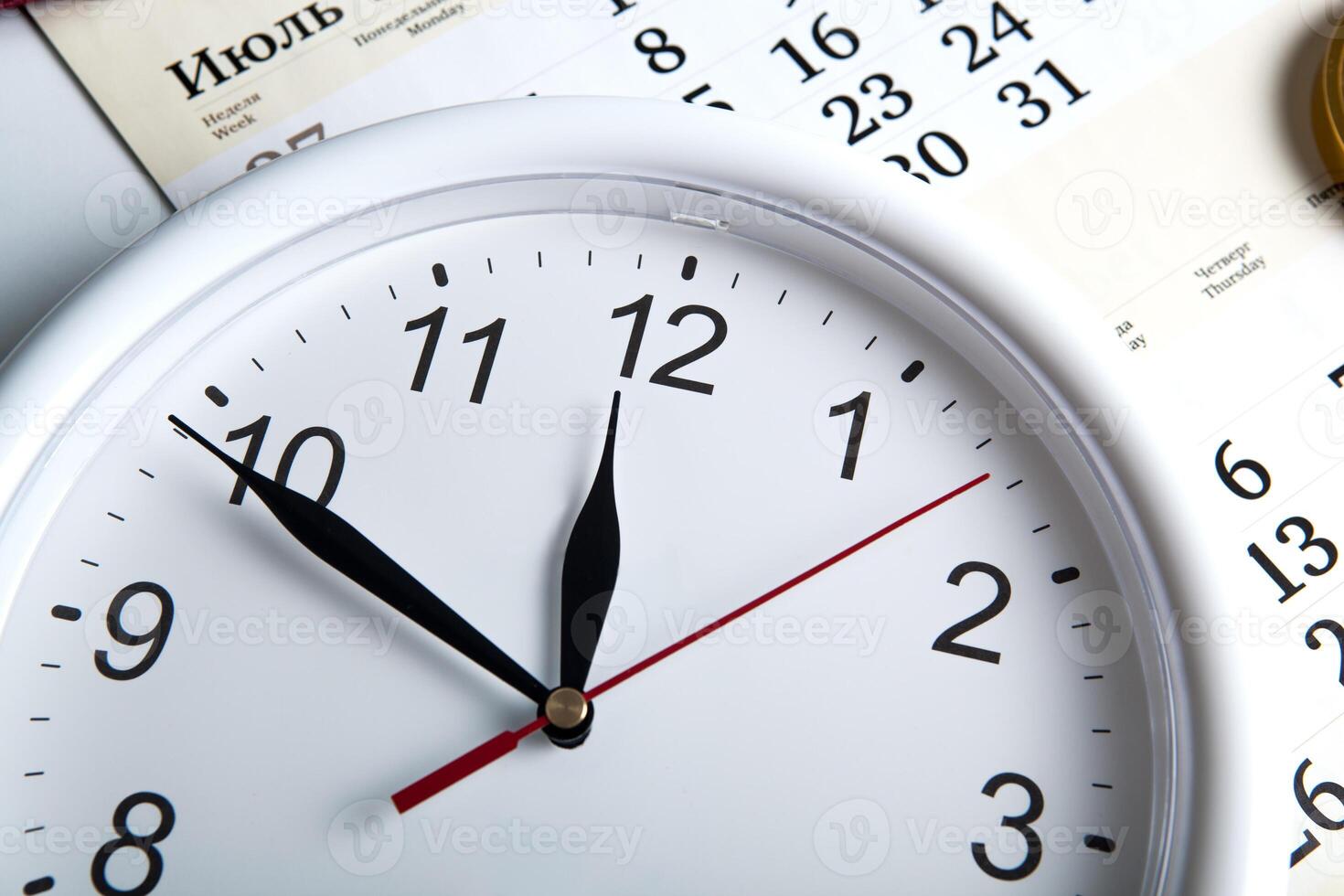 sheet of a calendar with clockface photo