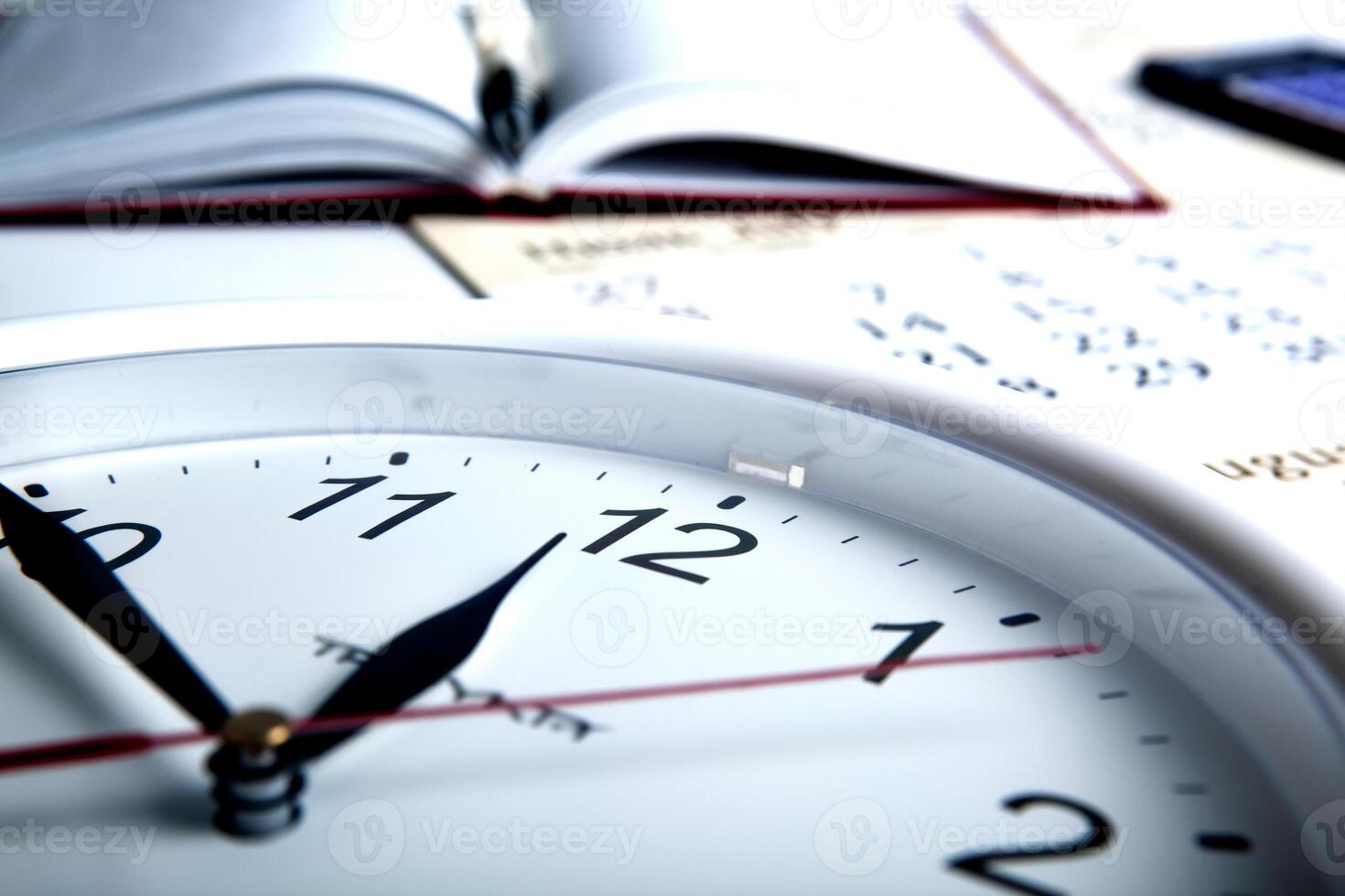 business stil life with clockface photo