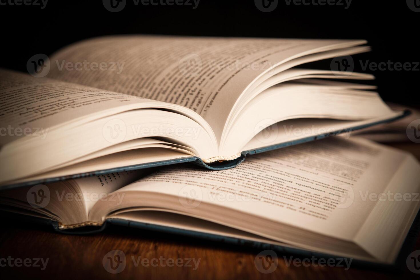 stack of open books photo