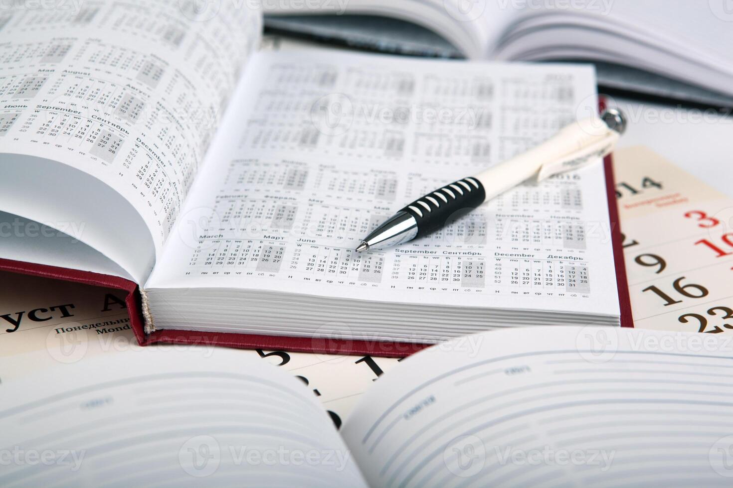 calendar days with numbers and pen photo