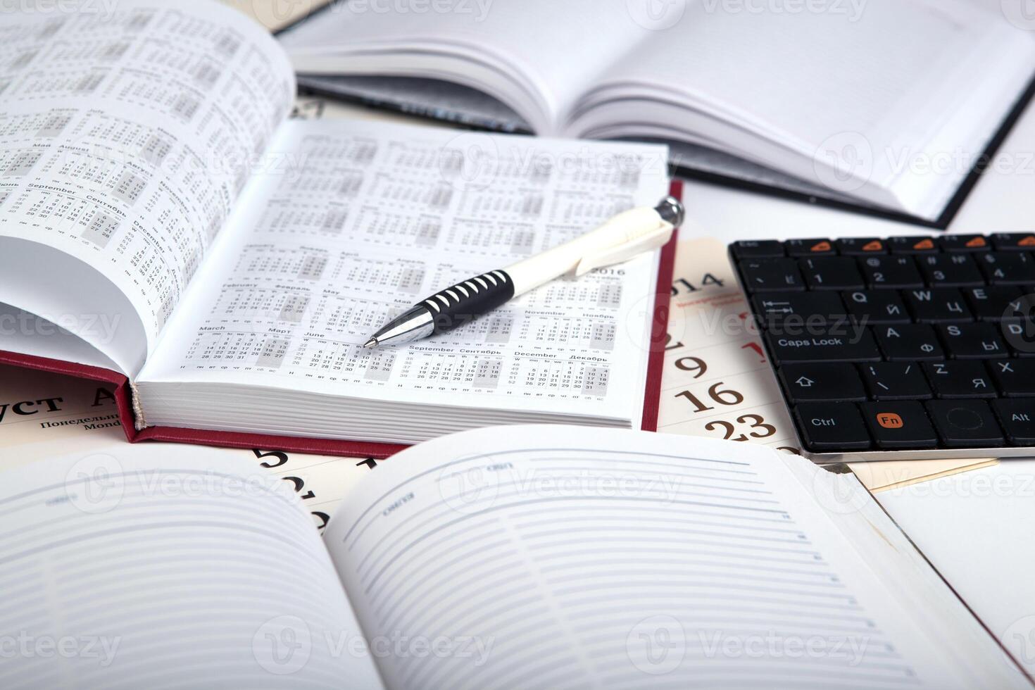 calendar days with numbers and pen photo
