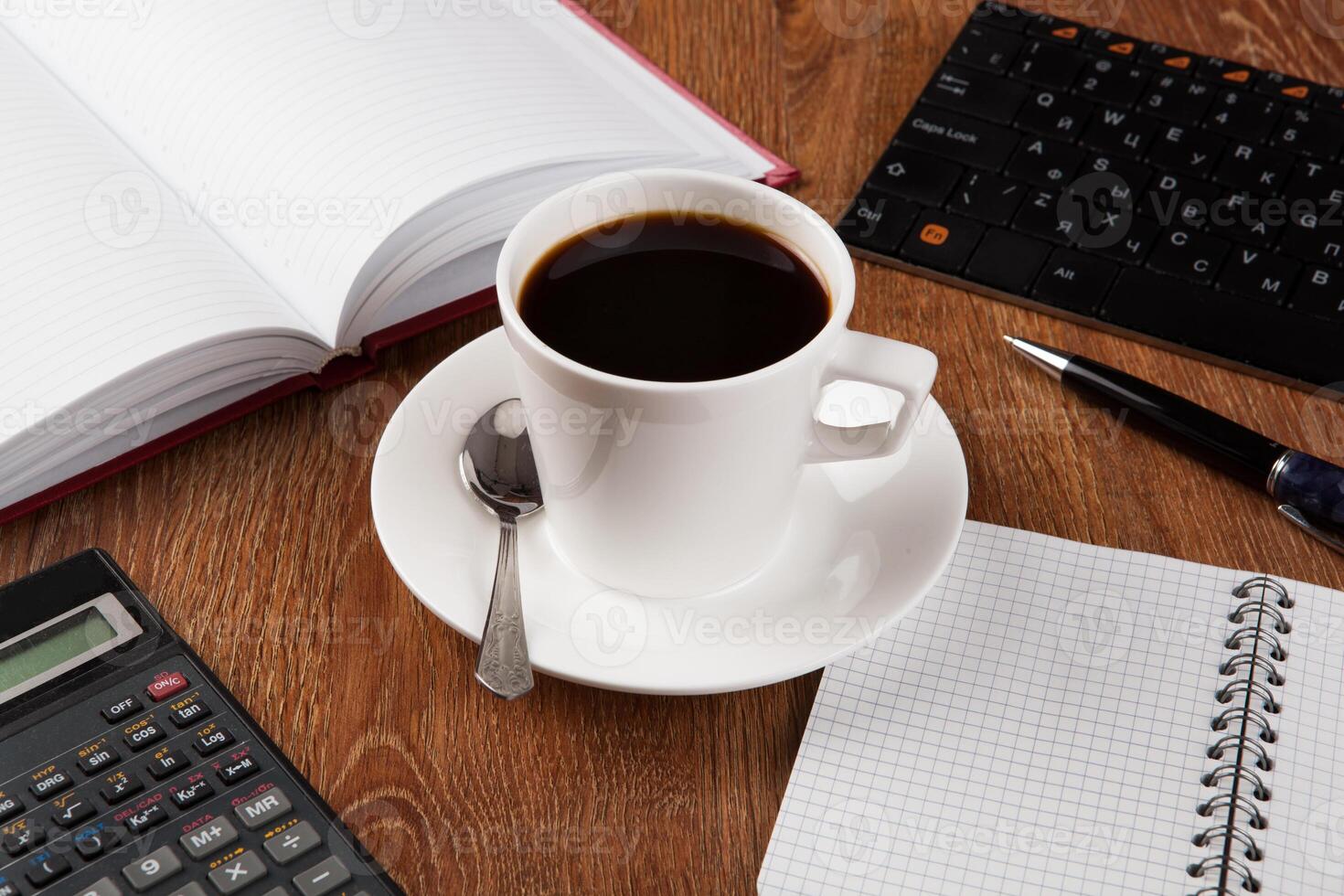 business still life with cup of black coffee photo