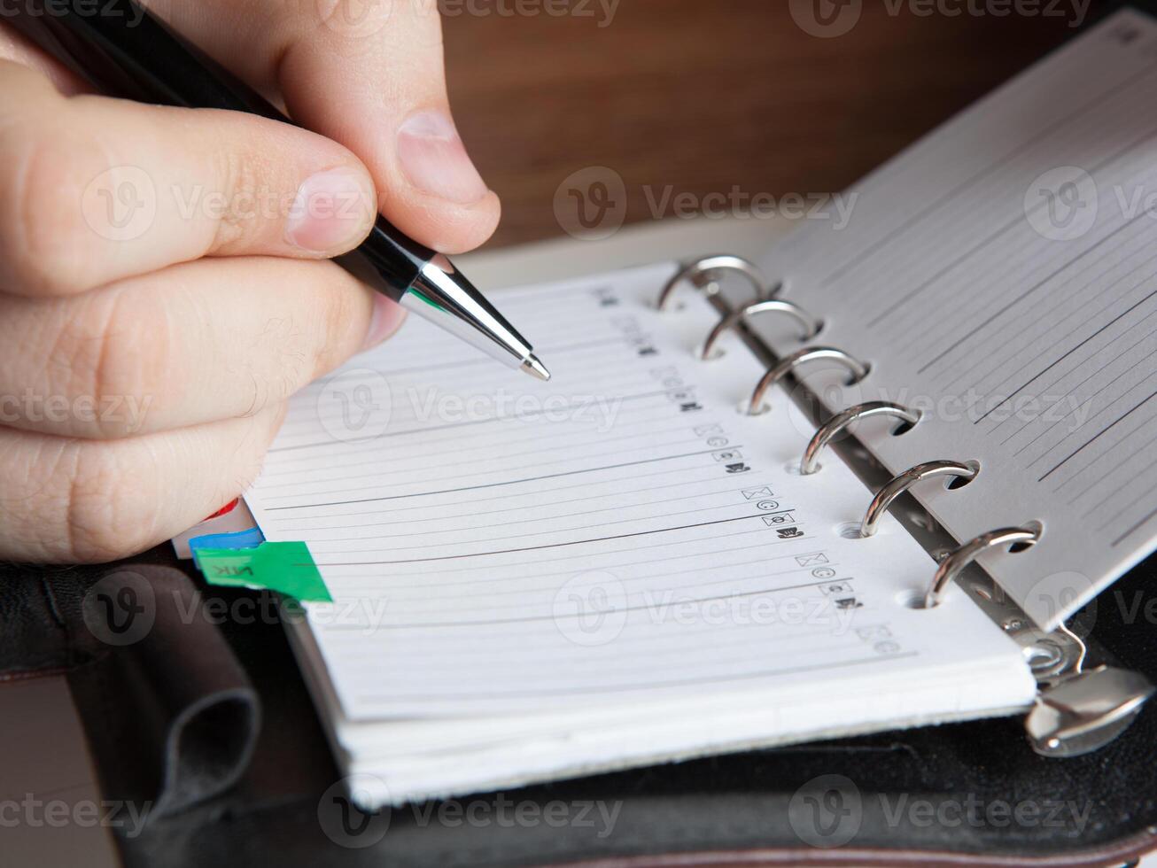 man running with diaries photo