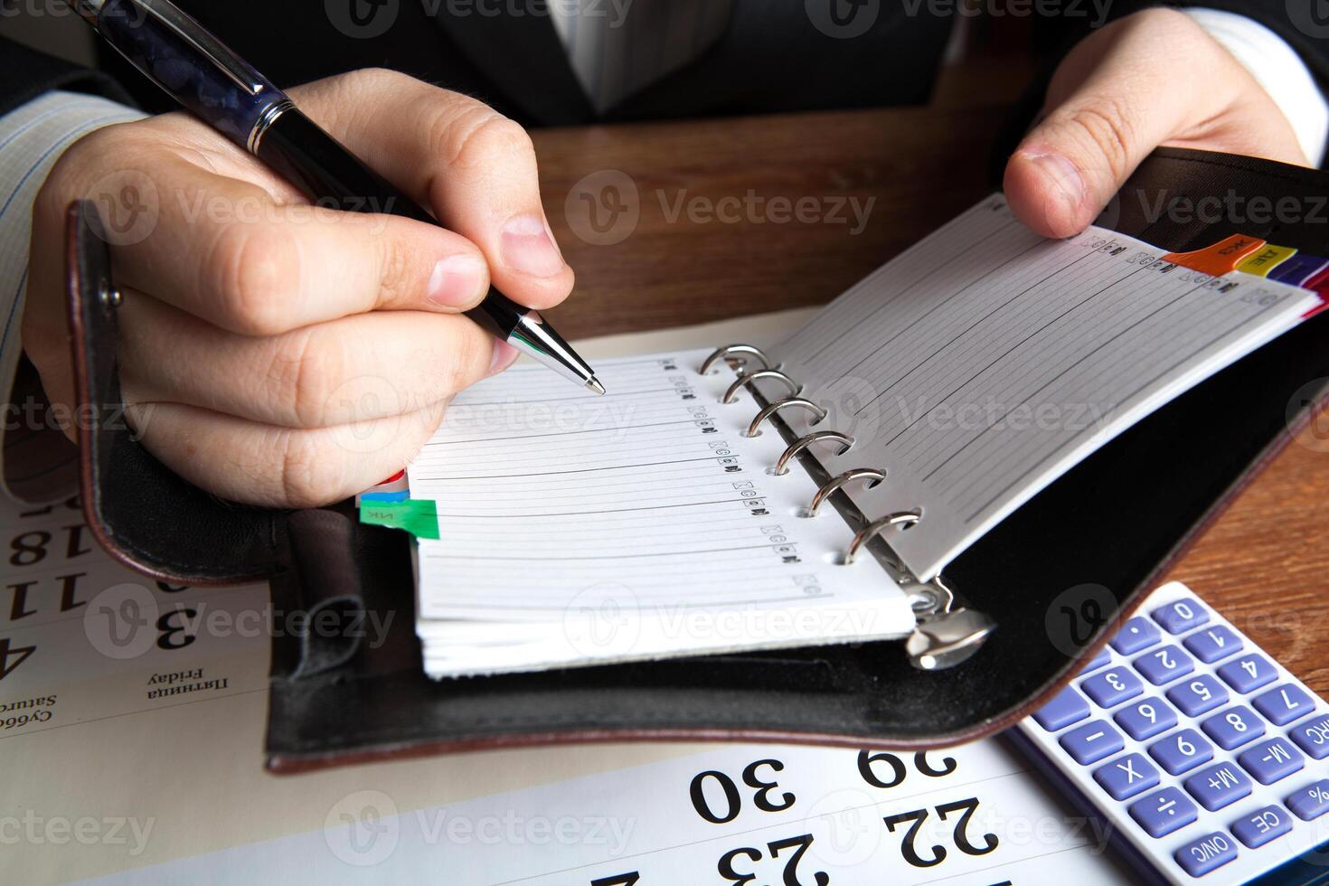 man running with diaries photo