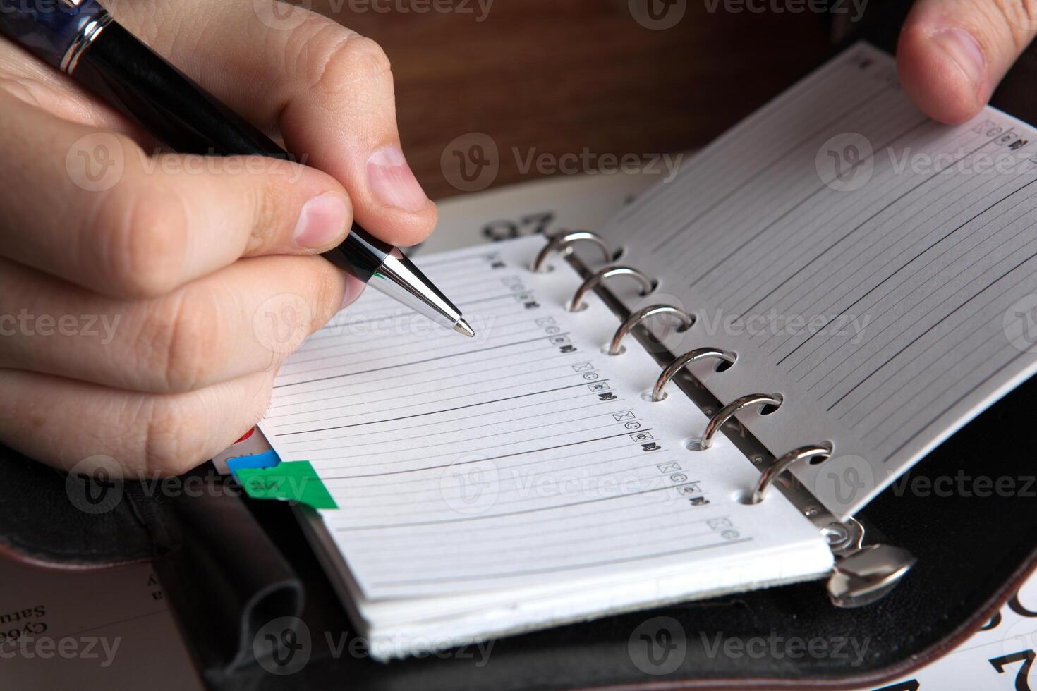 man running with diaries photo