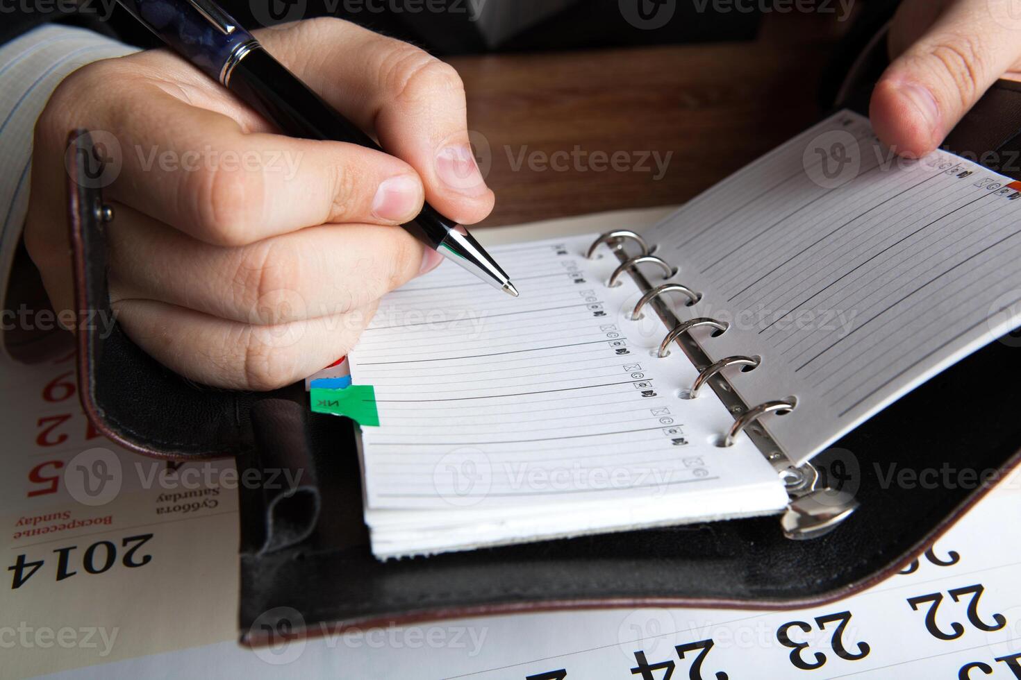 man running with diaries photo