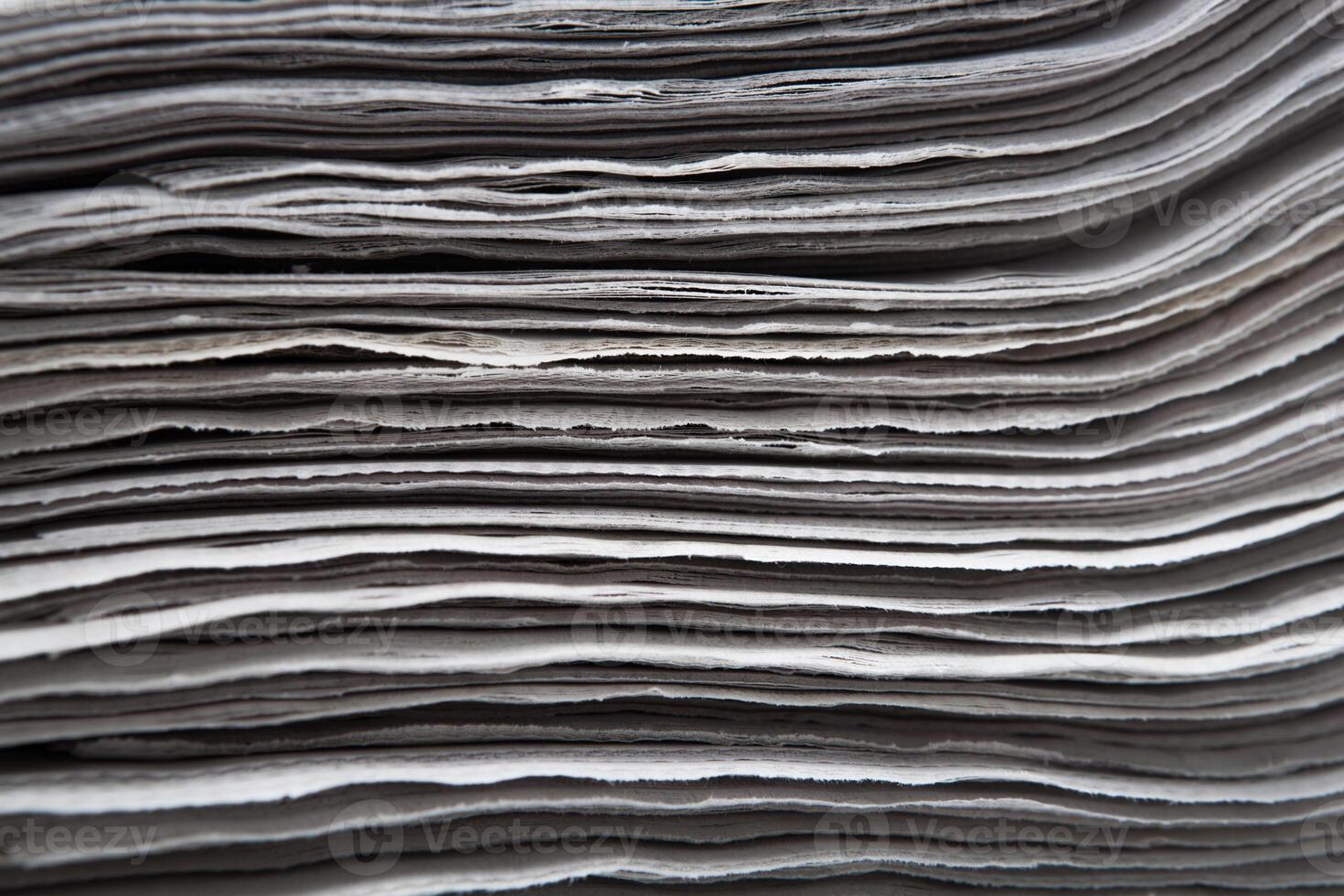 stack of newspapers closeup photo