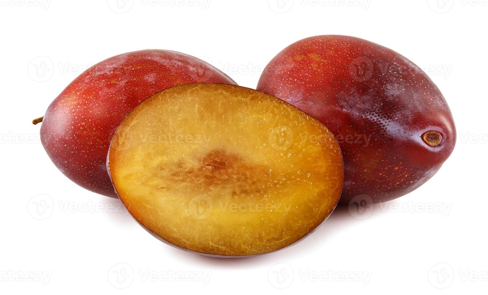 plums isolated on white background. photo