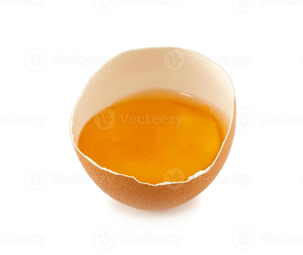 Broken egg isolated on white background photo