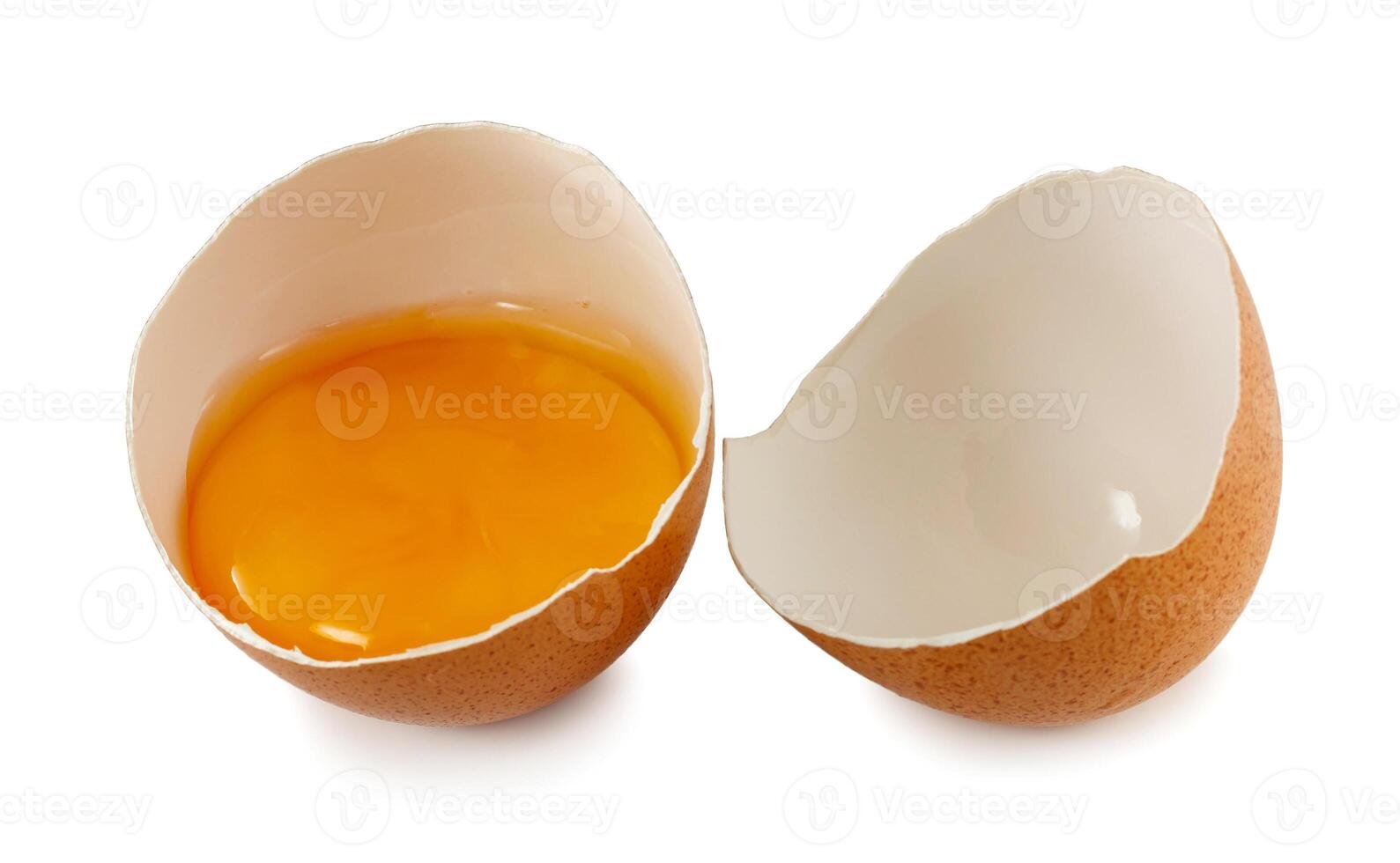 Broken egg isolated on white background photo