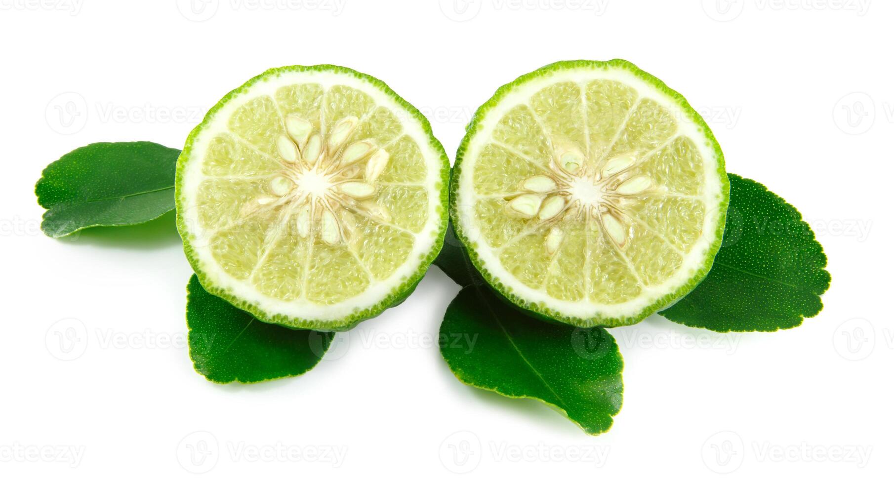 Bergamot and kaffir lime leaves on white background photo