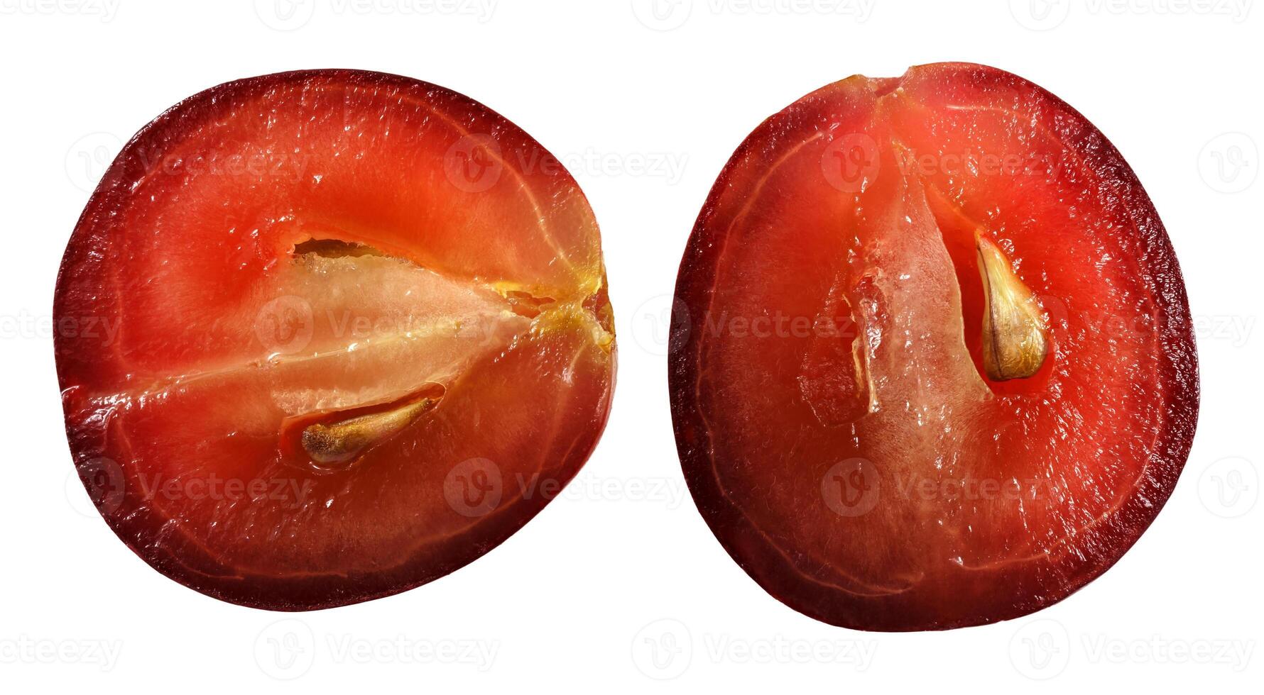 Translucent slice of red grape fruit, macro isolated on white photo