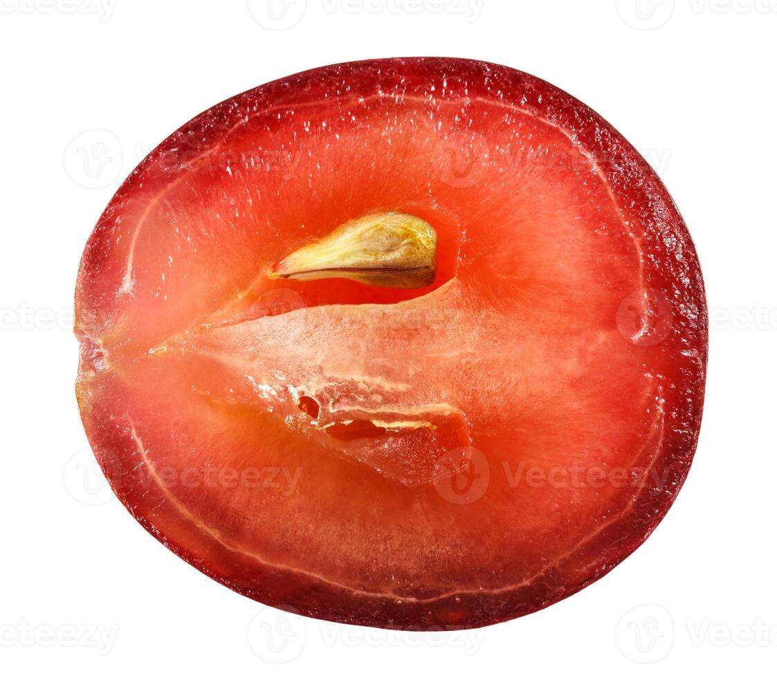 Translucent slice of red grape fruit, macro isolated on white photo