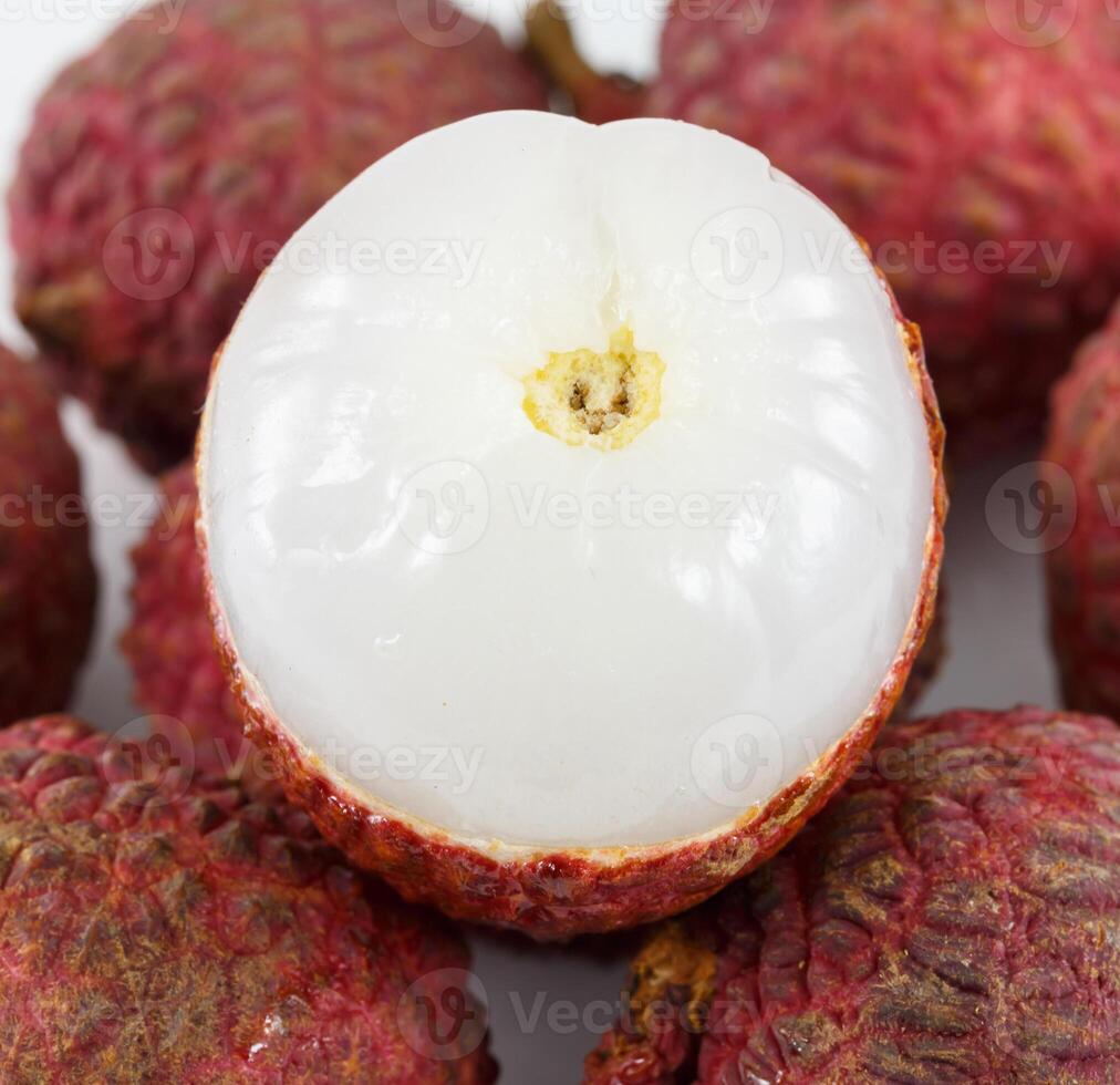 Lychee. Fresh lychees isolated on white photo