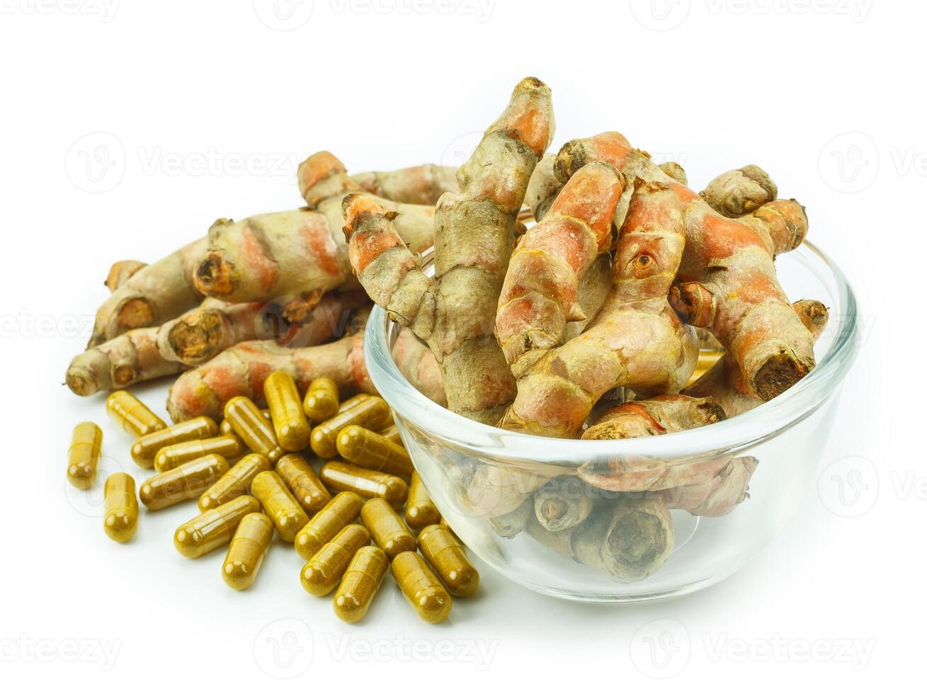 Turmeric root and turmeric capsule powder for alternative medicine ,spa products and food ingredient. photo