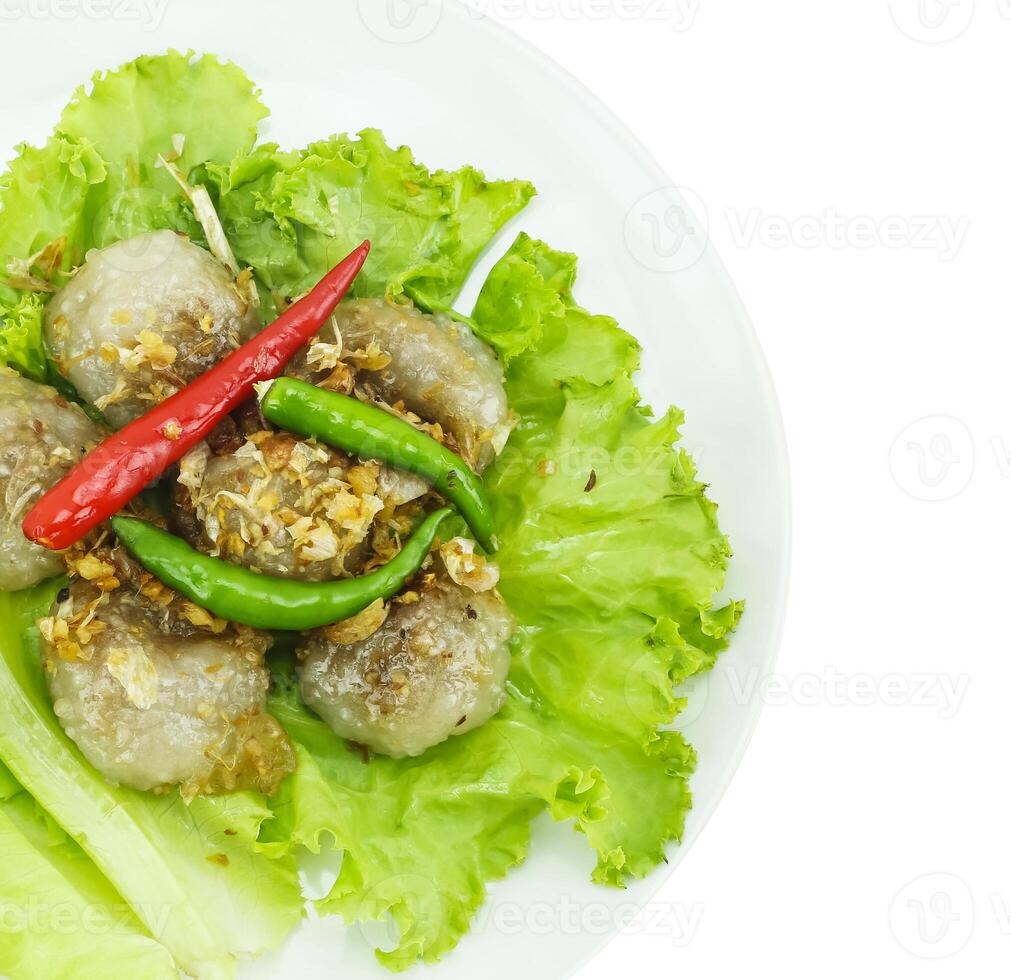 Steamed tapioca balls with peanut and pork filling photo