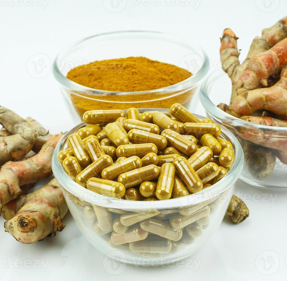 Turmeric root and turmeric powder for alternative medicine ,spa products and food ingredient. photo