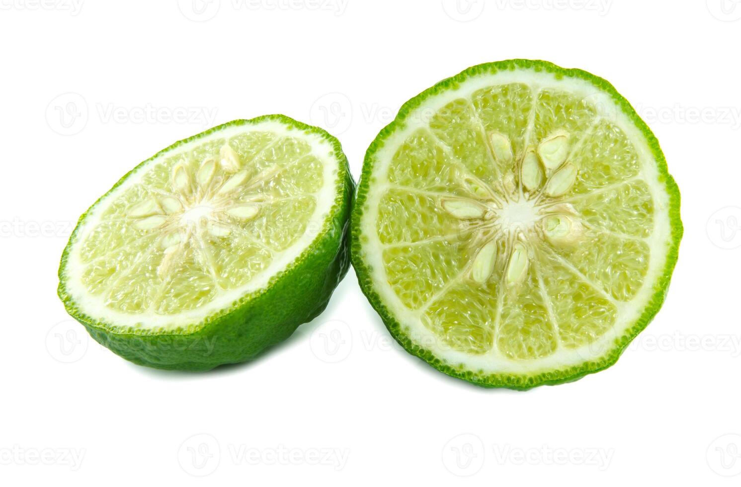 Bergamot and kaffir lime leaves on white background photo
