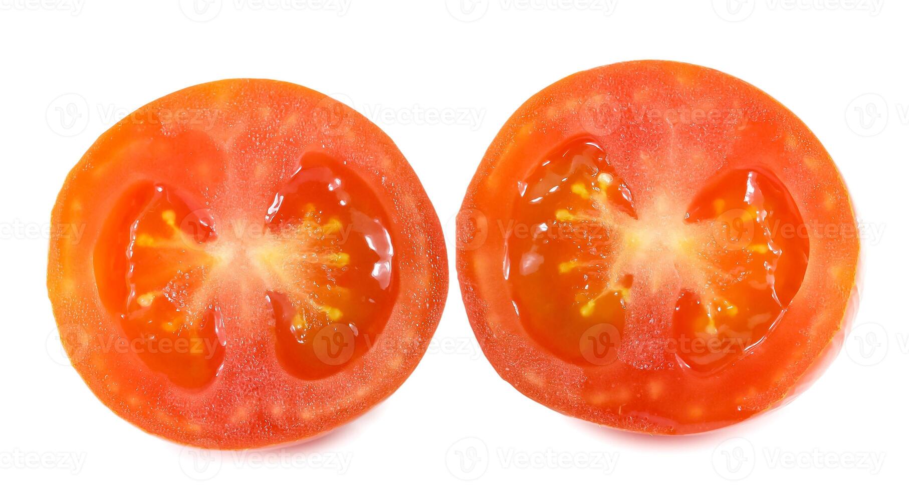 Slices of tomato isolated on white photo