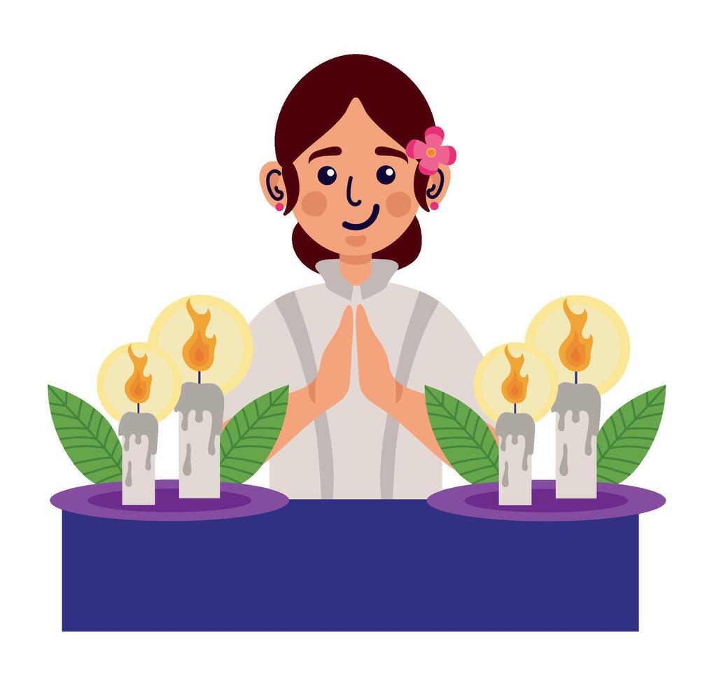 A woman praying with candles and flowers vector