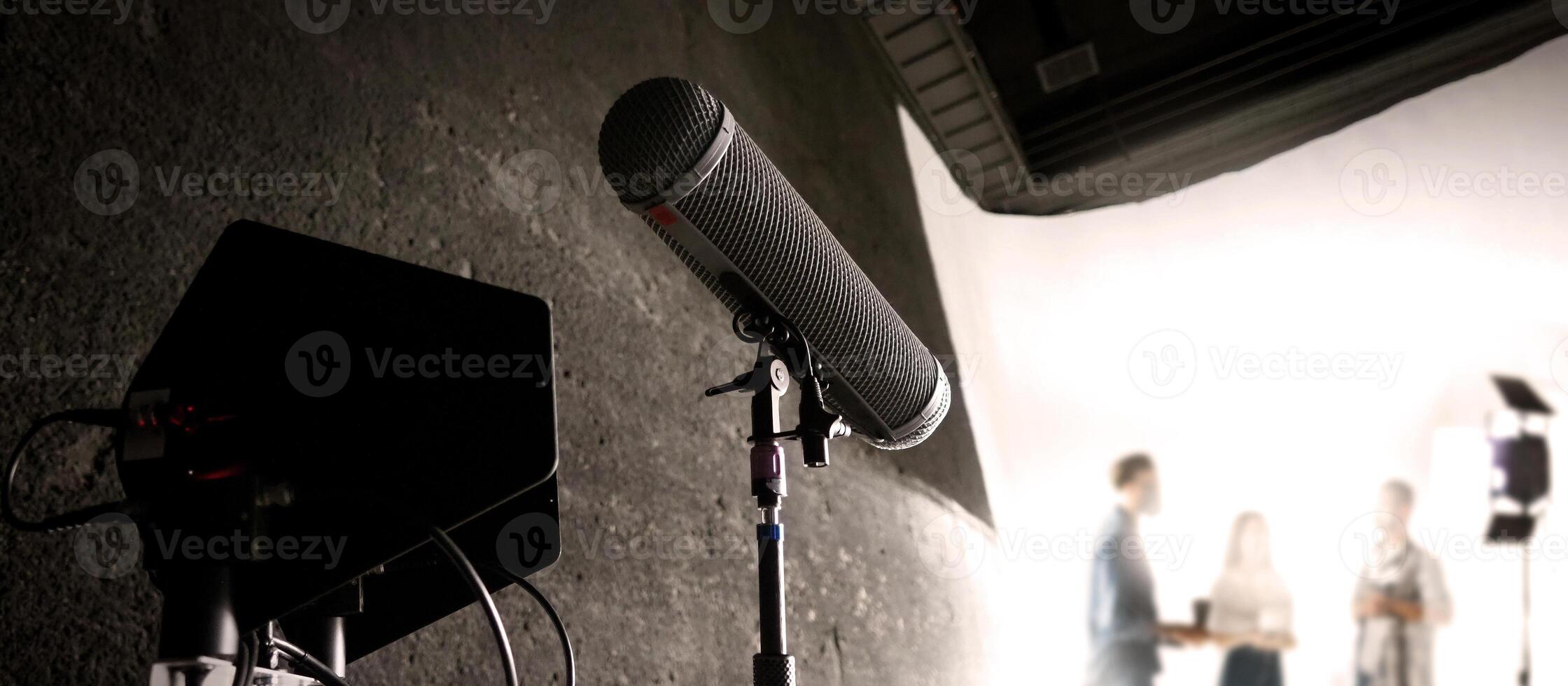 Boom Microphone on stand in Production which recording audio and ambient sound in studio. photo