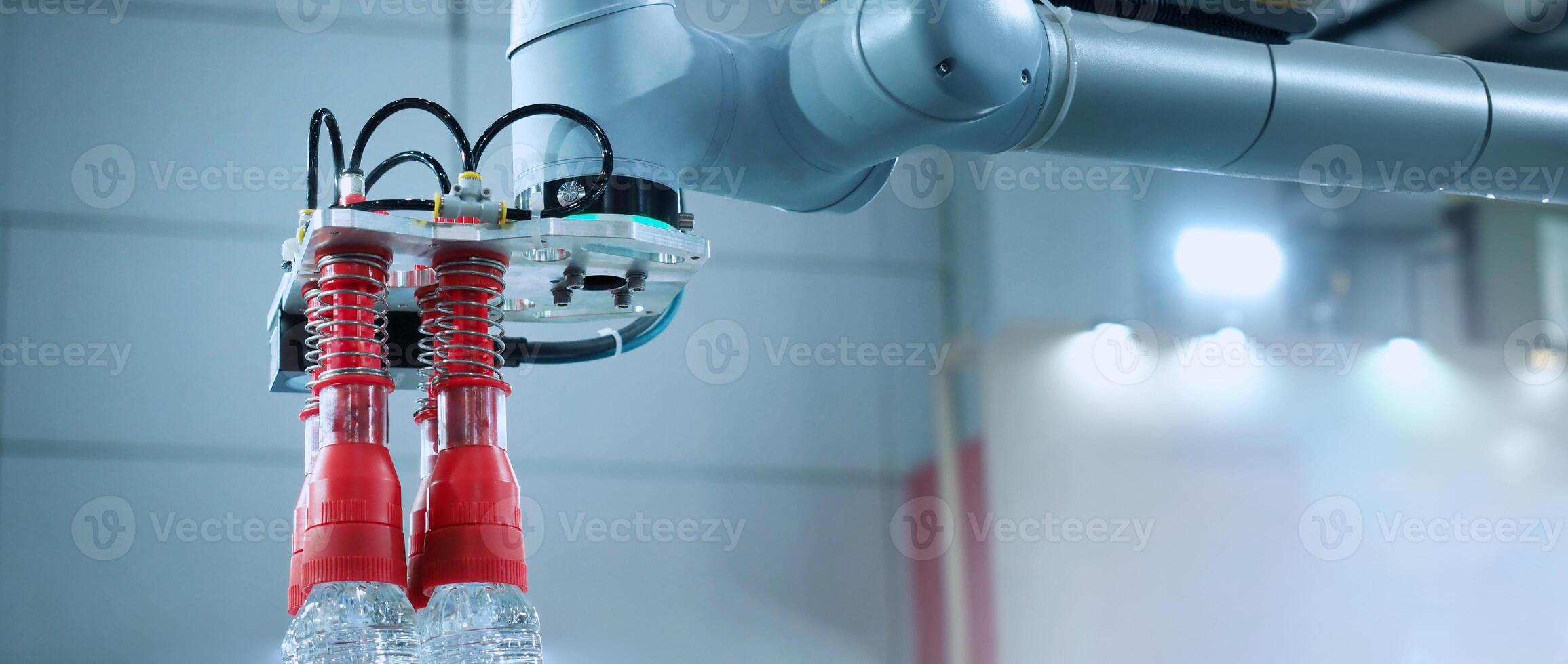 Robot arm Automation technology. Tools for saving energy effort and making the work of engineers more convenient in modern factories. Automation factory tech concept with robotic arms lifting goods. photo