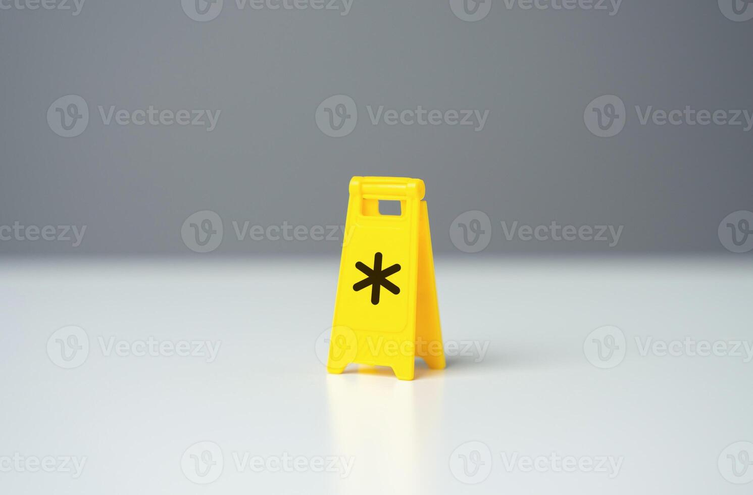 Warning sign with asterisk symbol conditions. Be careful with terms and conditions. Legal red tape and traps. Financial literacy, avoiding debt and not missing out on profits. Avoiding expenses fees photo