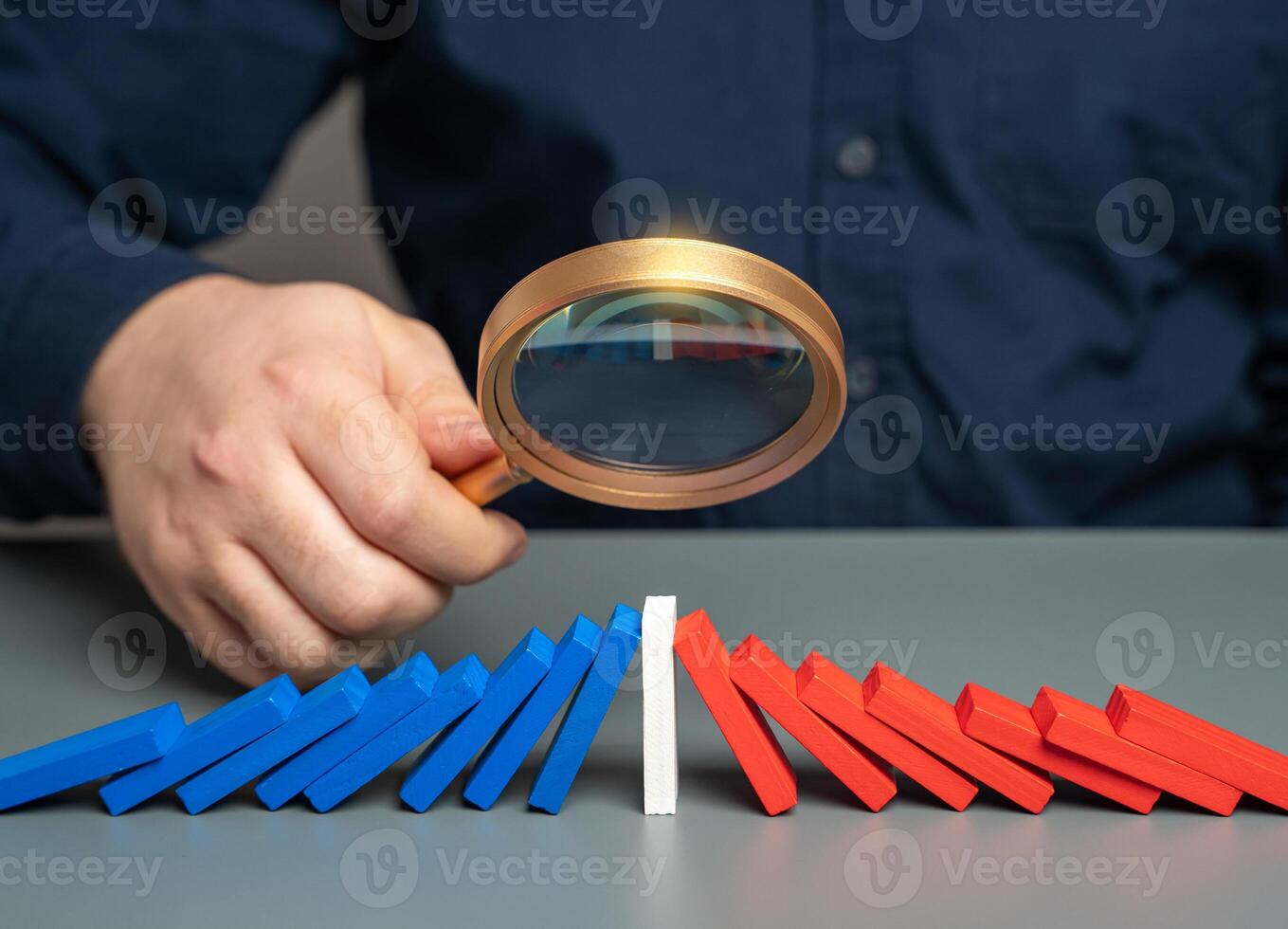 A man studies the opposition of the parties. The concept of a draw. Stop the conflict. Prevent escalation. Find points of compromise. A basis for starting negotiations. photo