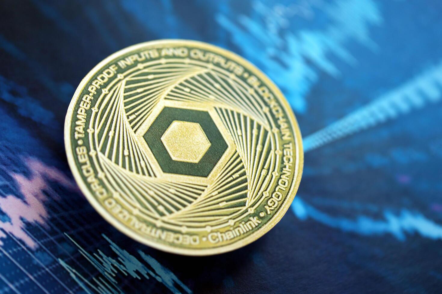 KYIV, UKRAINE - AUGUST 17, 2024 Chainlink LINK coin on abstract fictional cryptocurrency trading chart in blue color photo