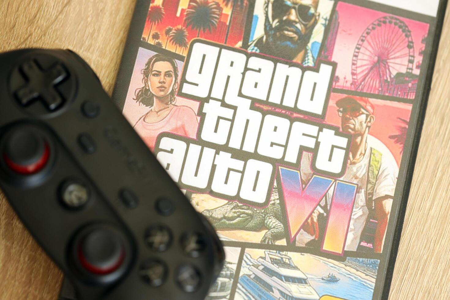 KYIV, UKRAINE - JUNE 26, 2024 Grand Theft Auto 6 PS5 game disc box for console gaming. Fictional fan-made game disc pack cover photo