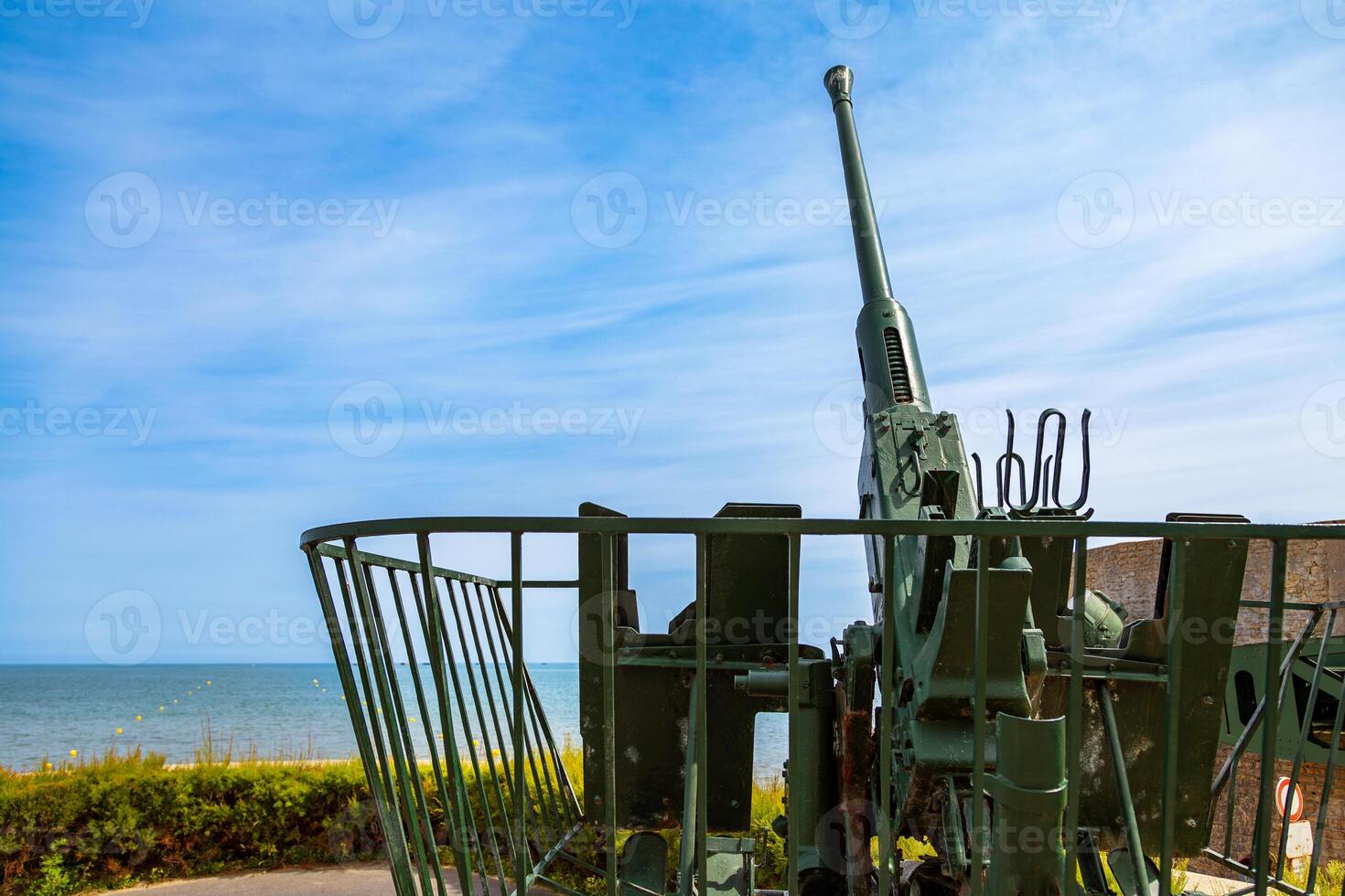 german gun emplacement of second world war on the coast of Arromanches in Normandy photo