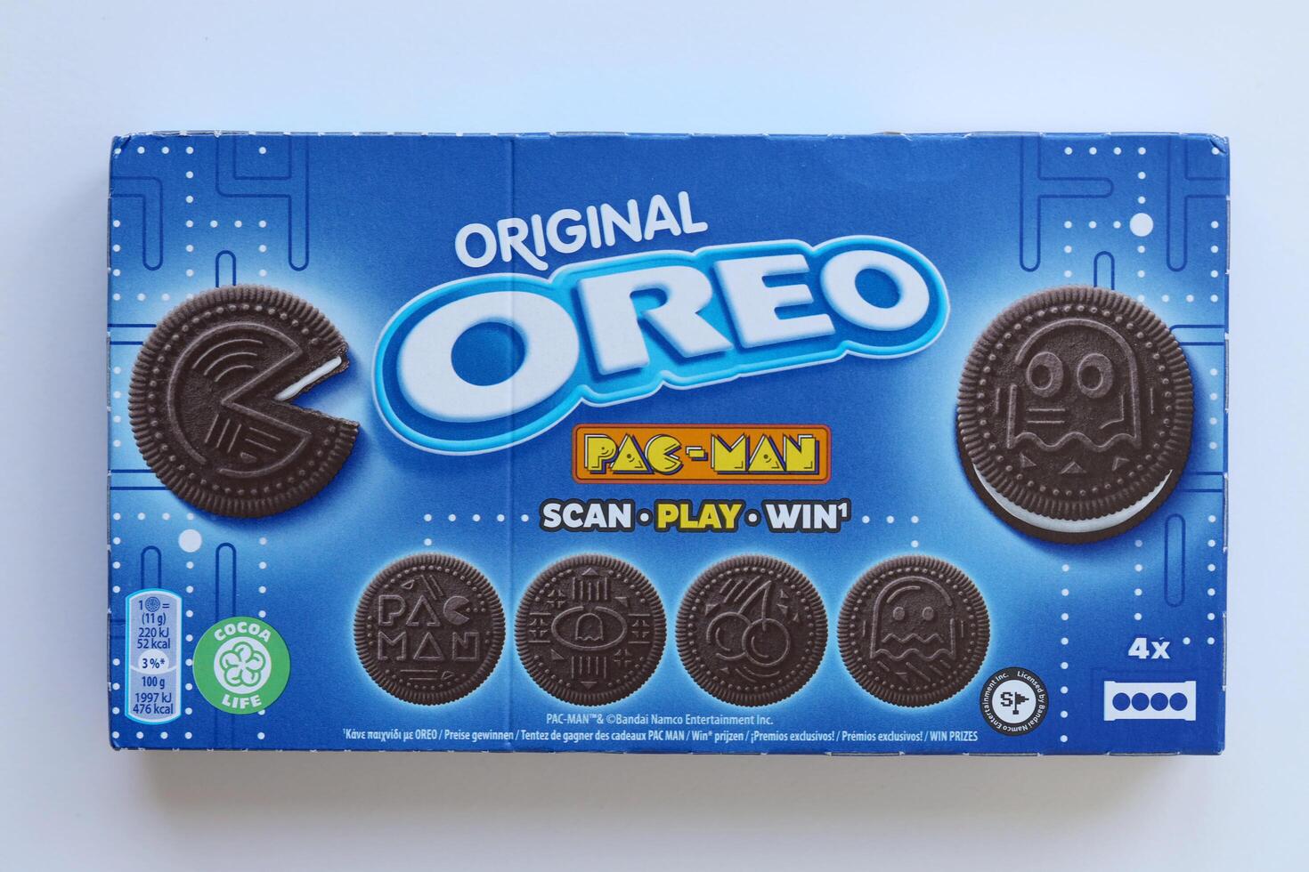 KYIV, UKRAINE - APRIL 20, 2024 Oreo pac-man crispy cookies packs. The brand Oreo owned by american company Mondelez international photo