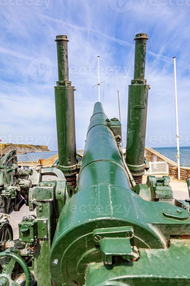german gun emplacement of second world war on the coast of Arromanches in Normandy photo