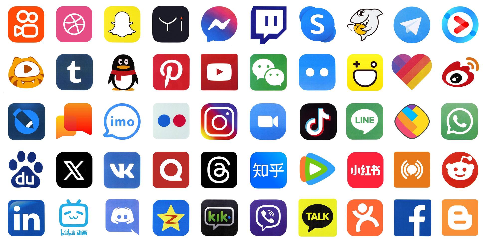 KYIV, UKRAINE - APRIL 1, 2024 Many icons of social media, messengers, sharing platforms photo