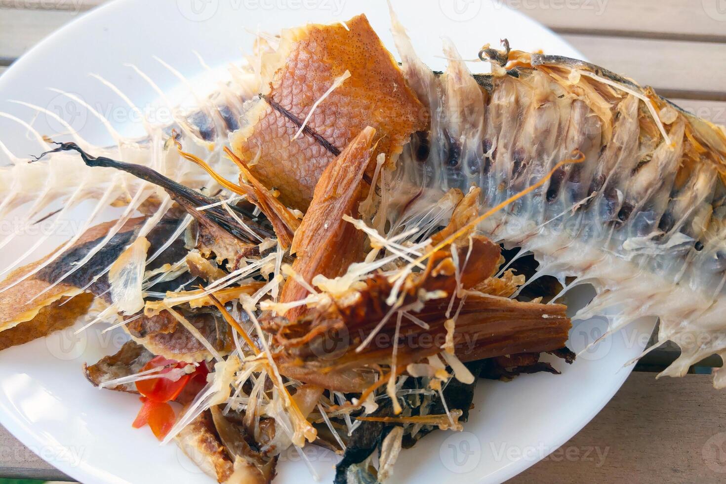 Deconstructed Fish Bone with Crispy Skin and Vegetables - Culinary Art, Fine Dining Presentation photo