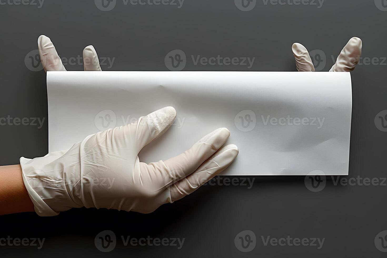 Gloved Hands Handling White Paper on Gray Background Cleanliness, Medical Safety, Editing Design photo