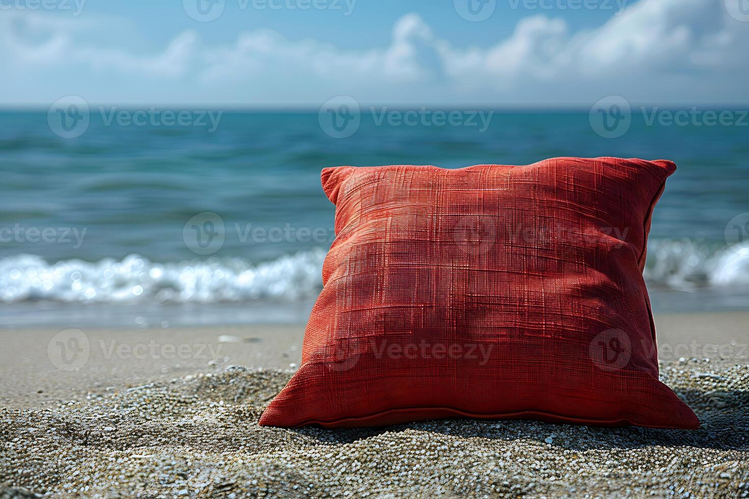 Serene Beach Scene with Red Pillow on Sandy Shore Relaxation, Tranquility, Summer Vacation Concept for Posters, Prints photo