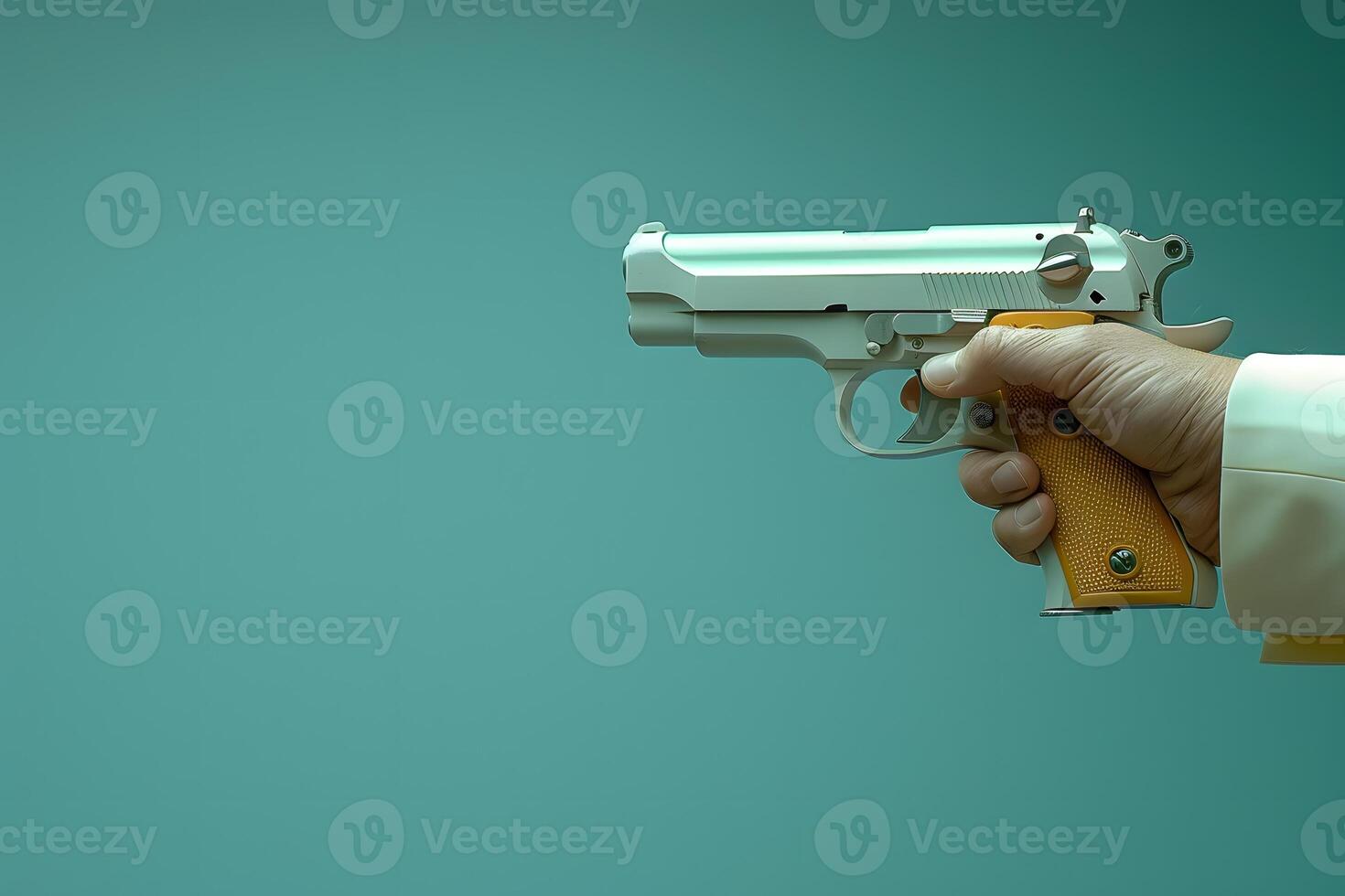 Hand Holding a Modern Silver Handgun on a Teal Background for Security and Defense Themes photo