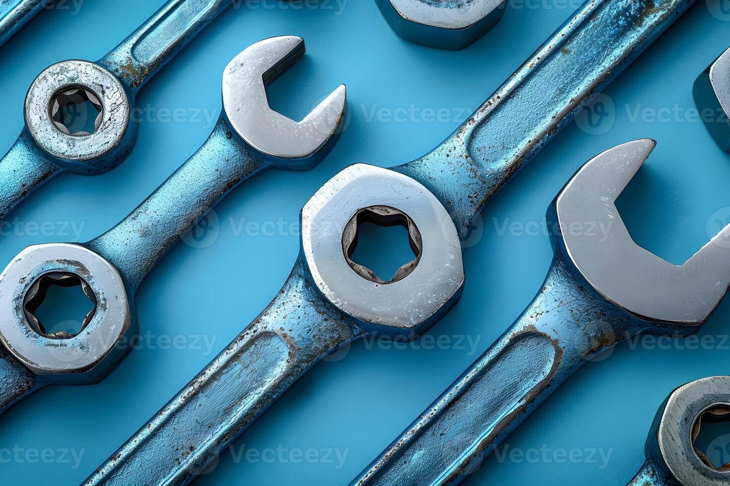 Rustic Blue Metal Wrenches on Blue Background - Tools, Maintenance, Mechanical, Industrial Design for Posters, Advertisements photo