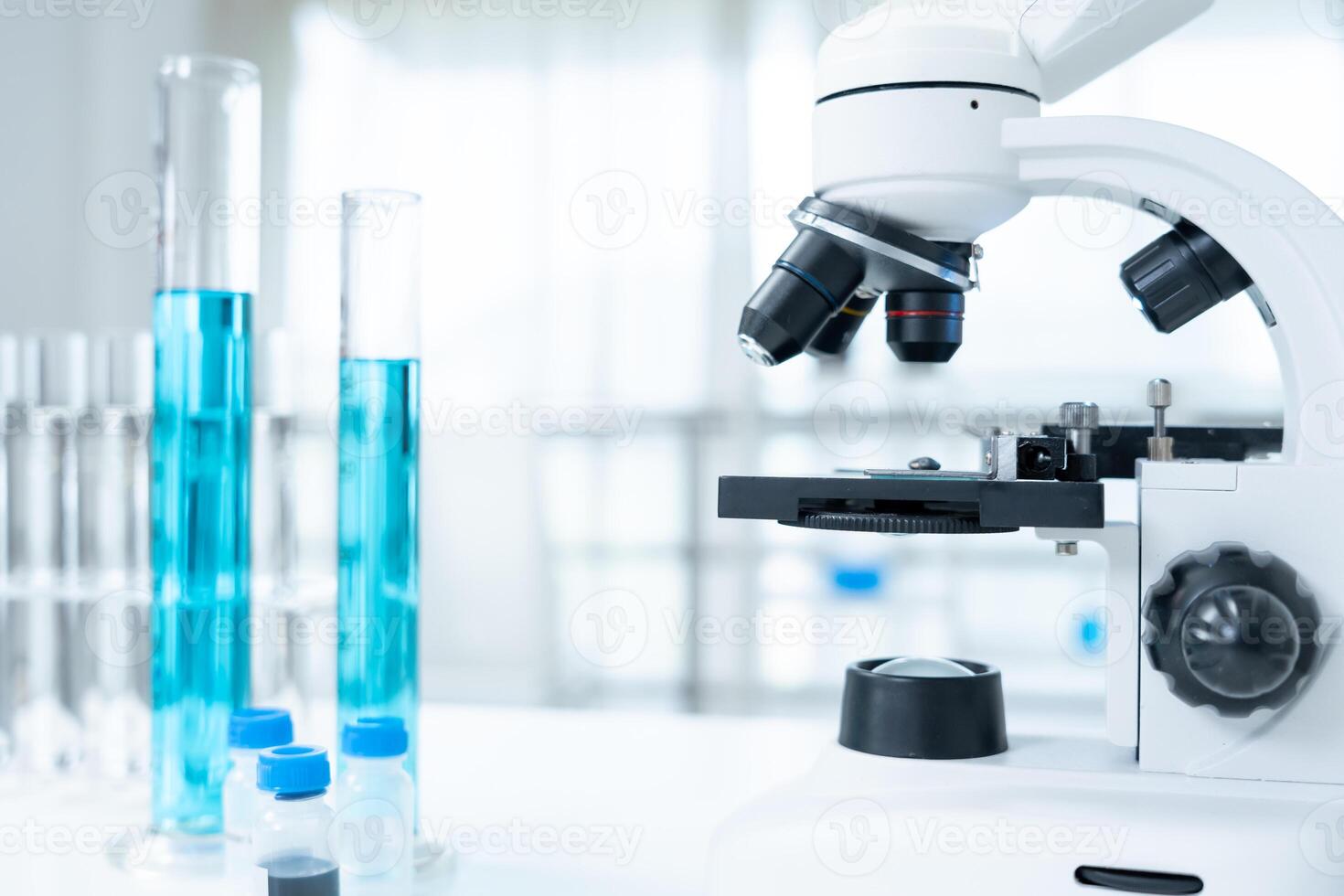 analyze biochemical samples in advanced scientific laboratory. Medical professional use microscope look microbiological developmental of viral. Biotechnology research in science lab. photo
