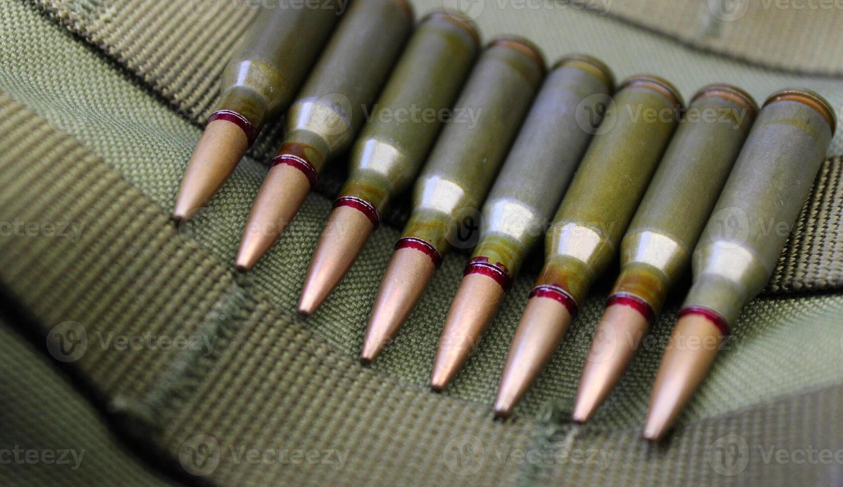 Ammunition in line on the bottom of a military helmet closeup view photo