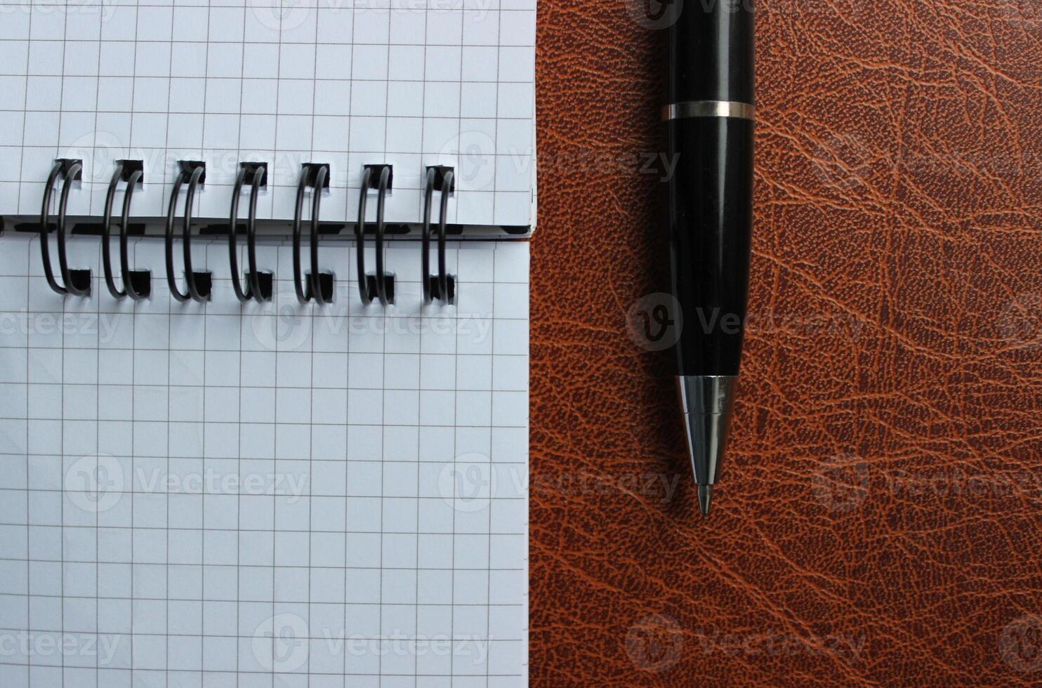 Binder Notepad With White Pages And Opened Pen On A Leather Folder Stock Photo For Title Or Business Logo