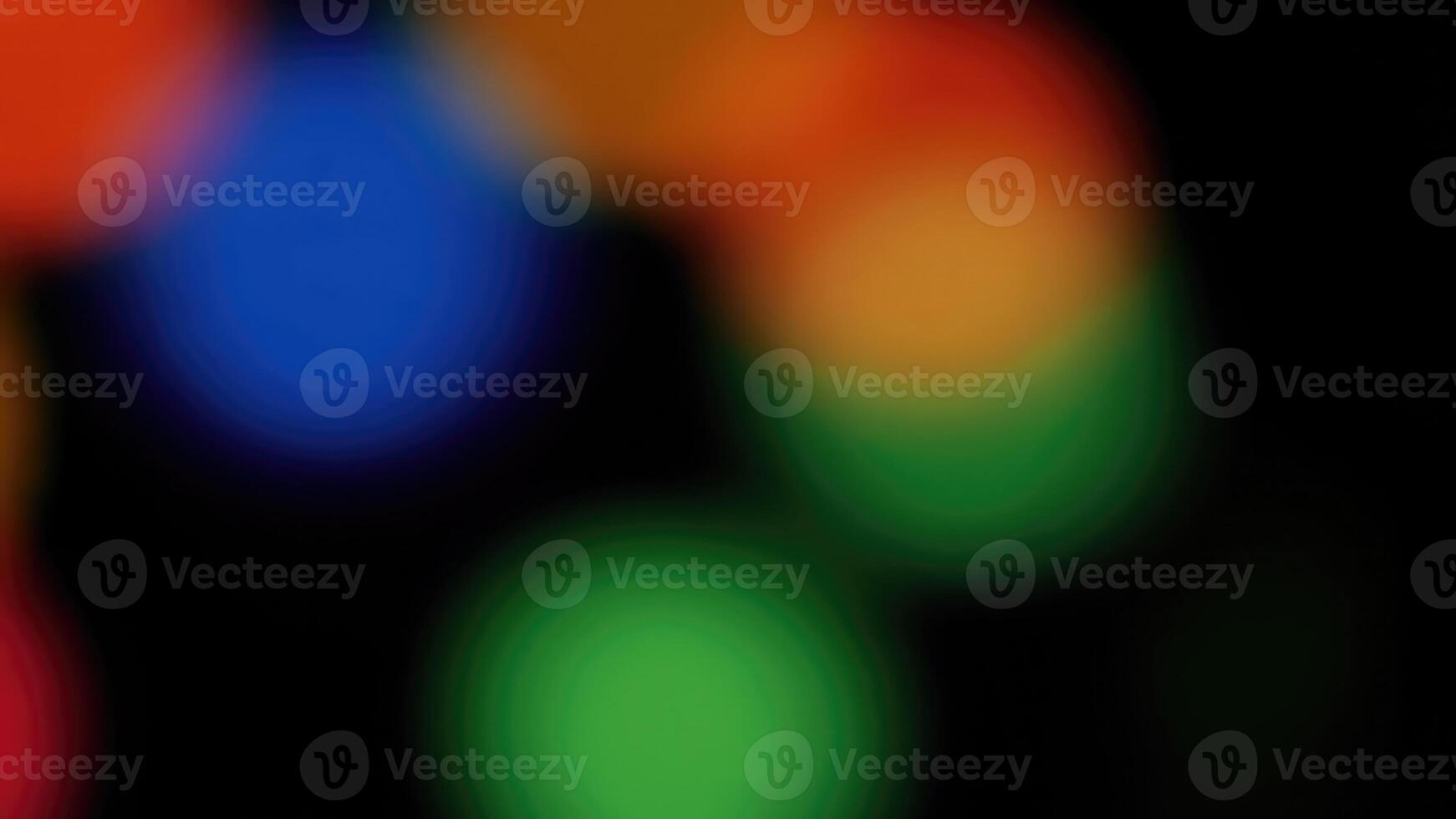 Colorful Blurred Lights Creating a Vibrant Nighttime Atmosphere at an Outdoor Event photo